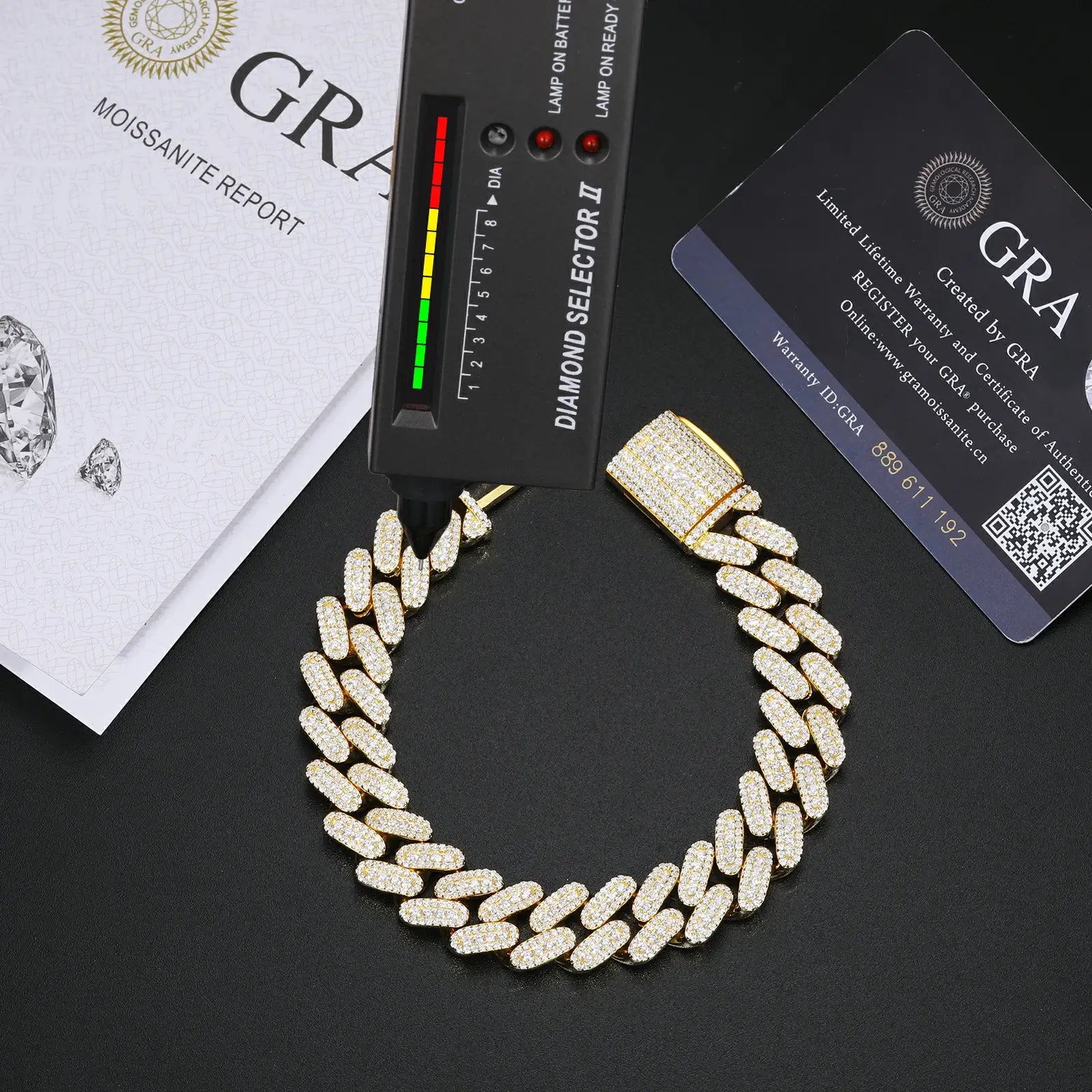 12mm yellow gold 925 sterling silver 3 row moissanite Cuban link bracelet with diamond tester + GRA certificate on black table — certified luxury jewelry