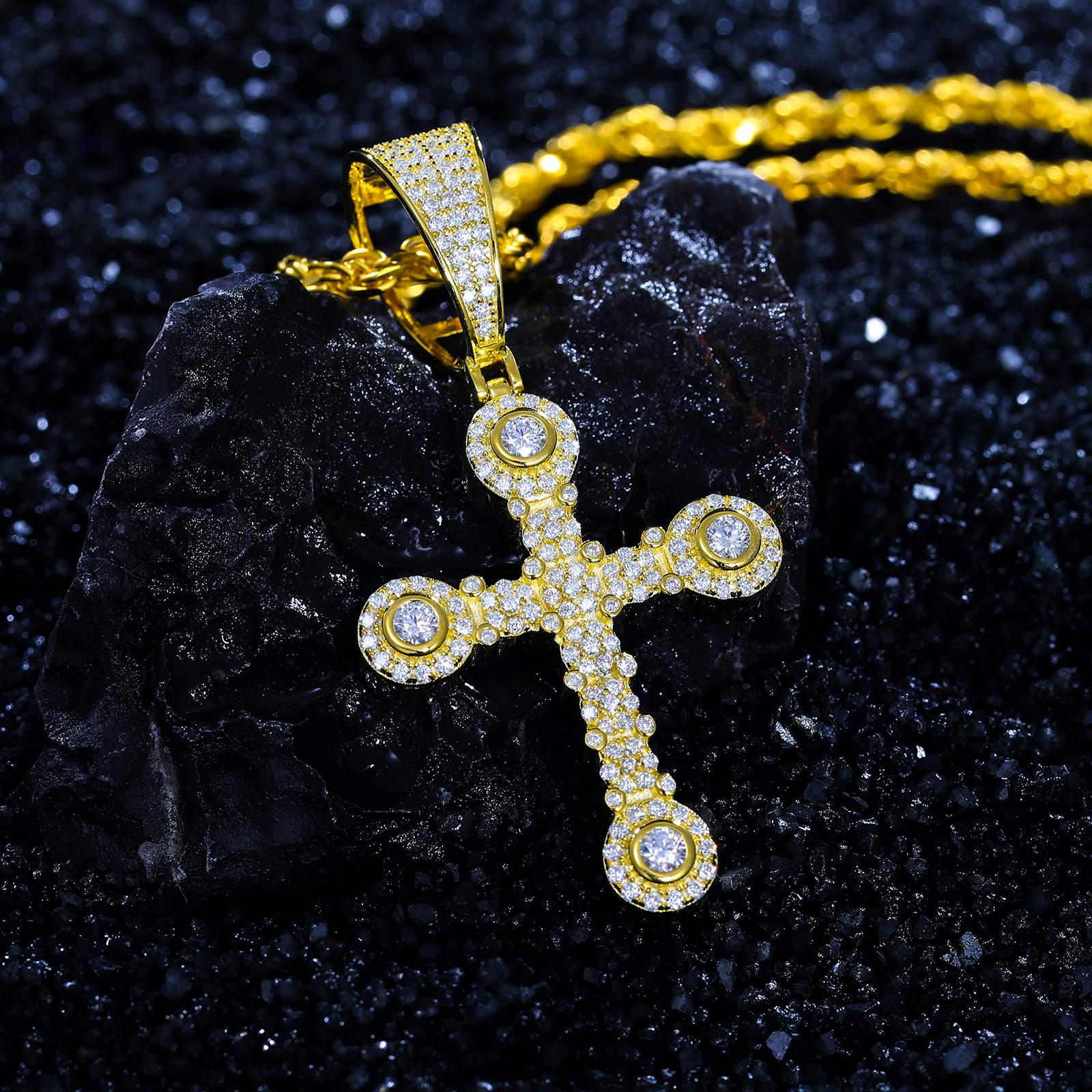 Art-directed angle: Gold star cross pendant leaning on marble - 42 VVS moissanites embedded | Salt-water resistant S925 core