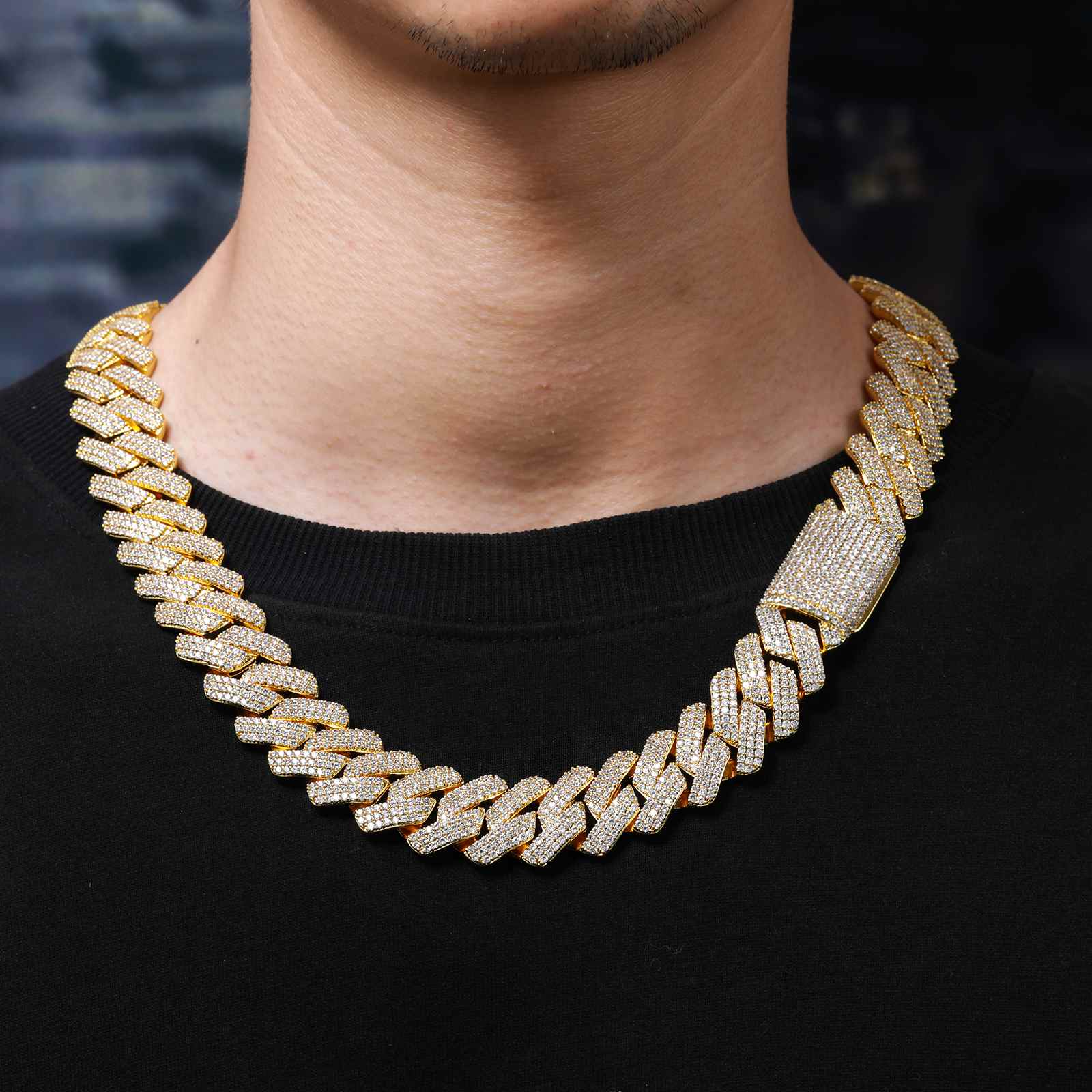 Stage-ready look: Male model rocking the 20mm Cuban Chain with gold grillz and a leather jacket, embodying bold hip hop jewelry aesthetics