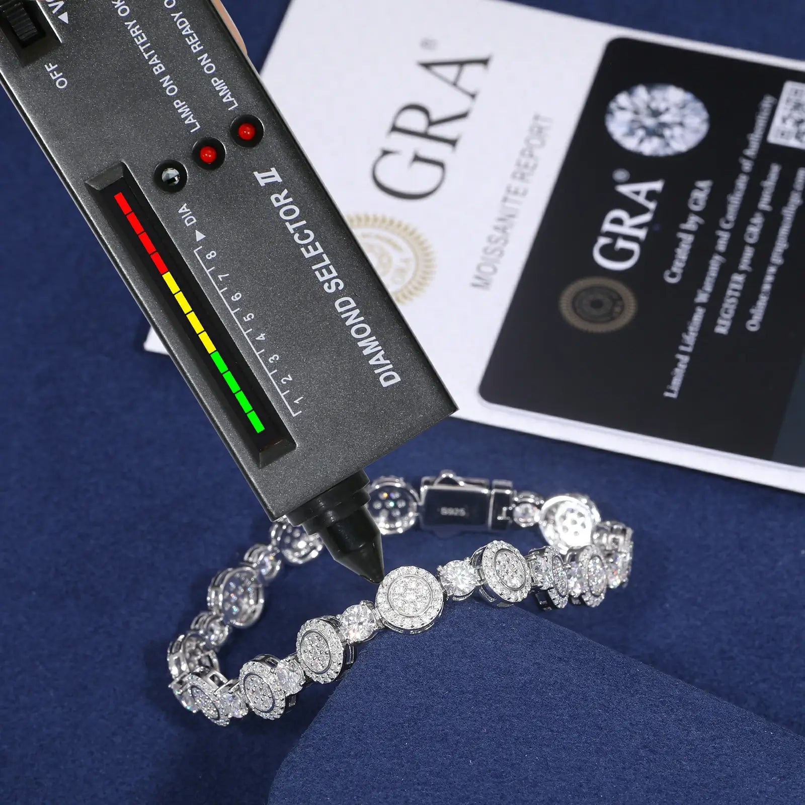 9mm white gold 925 sterling silver moissanite concentric circles tennis bracelet with diamond tester + GRA certificate on blue table — certified moissanite jewelry