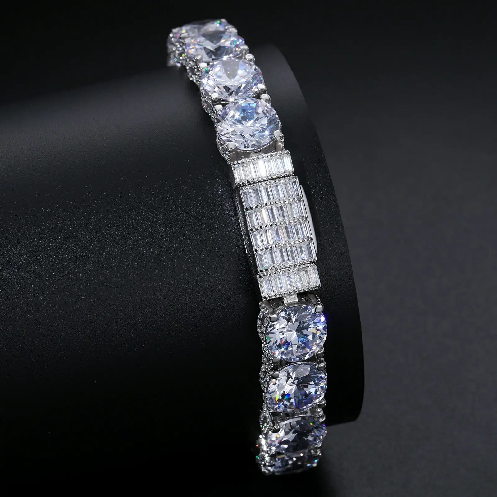 Close - up of 10mm white gold 925 sterling silver moissanite iced out tennis bracelet clasp on black table — showcasing secure closure & craftsmanship