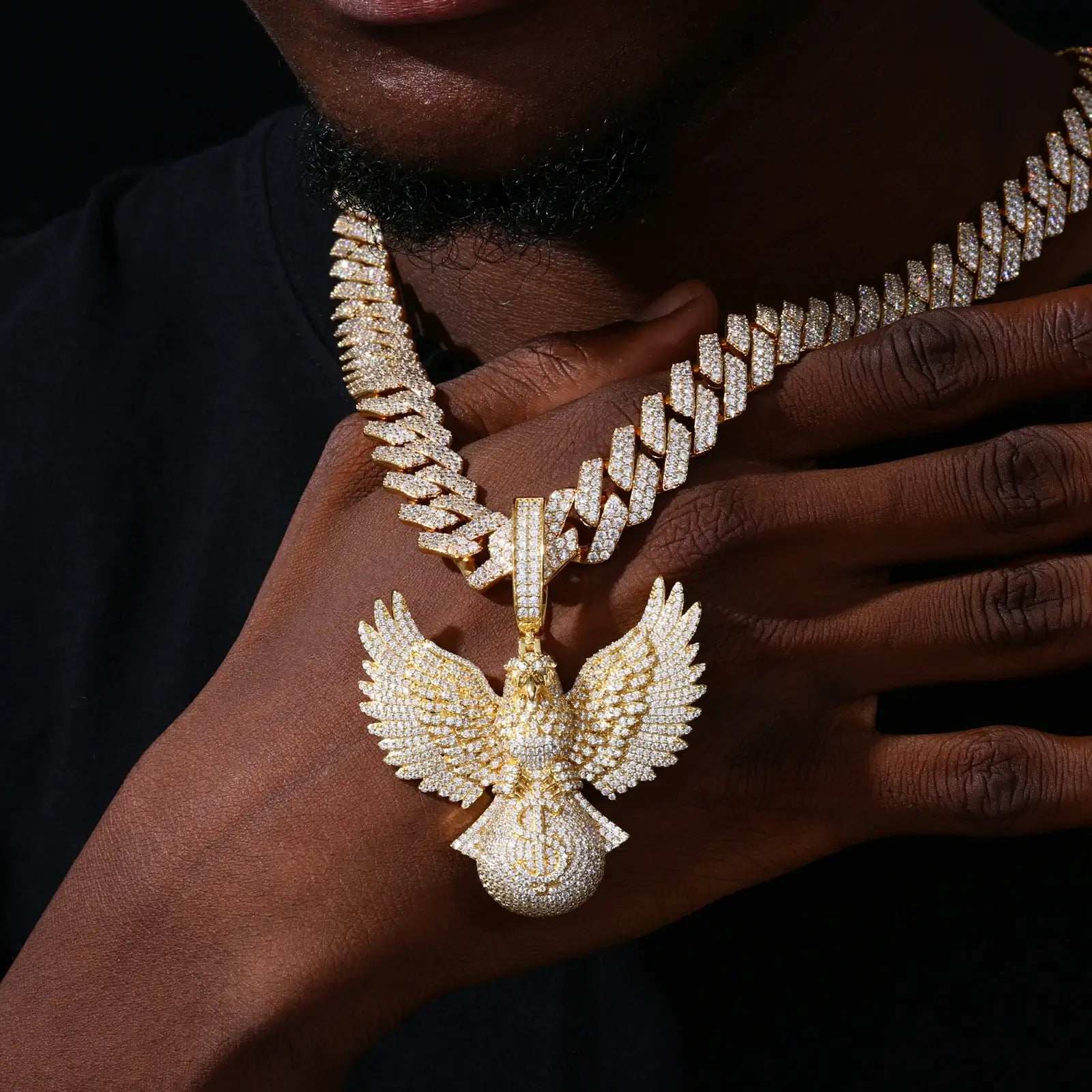 Gold 925 sterling silver moissanite bald eagle pendant worn with Cuban link chain — everyday hip-hop styling, moissanite brilliance, 925 silver comfort, wealth symbolism trend