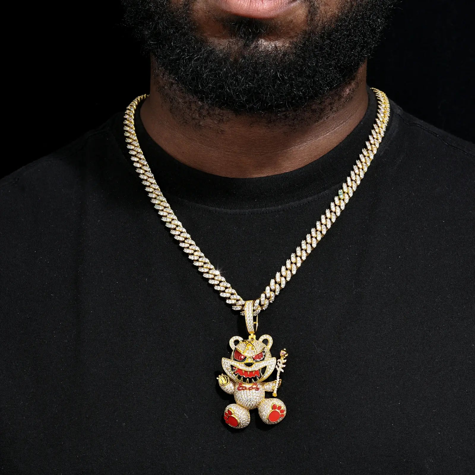 Male model rocking yellow gold 925 sterling silver moissanite evil bear pendant with Cuban link — regal evil bear design, hypoallergenic luxury