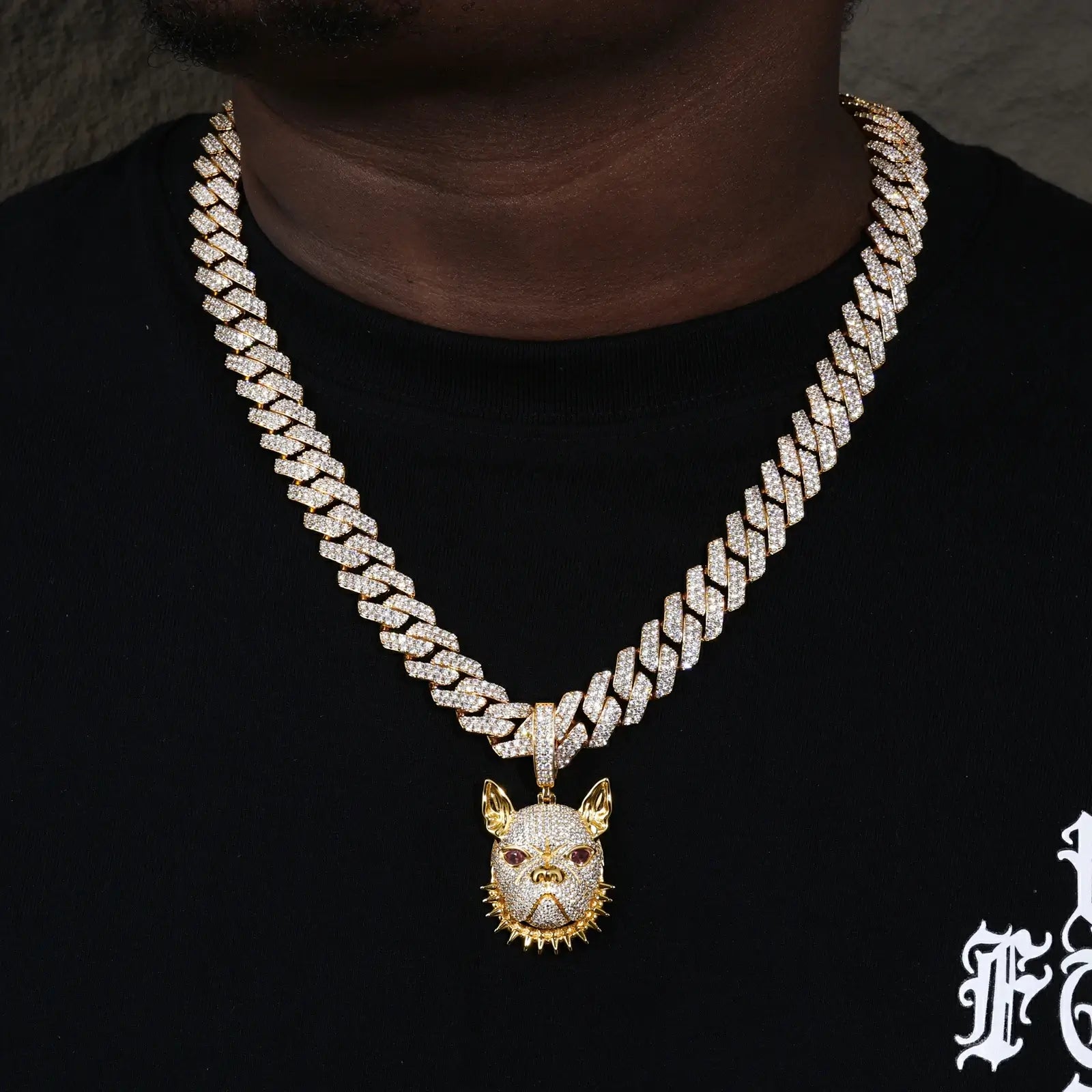 Male model rocking yellow gold 925 sterling silver moissanite pitbull spike collar pendant with Cuban link — bold hip-hop style, moissanite brilliance
