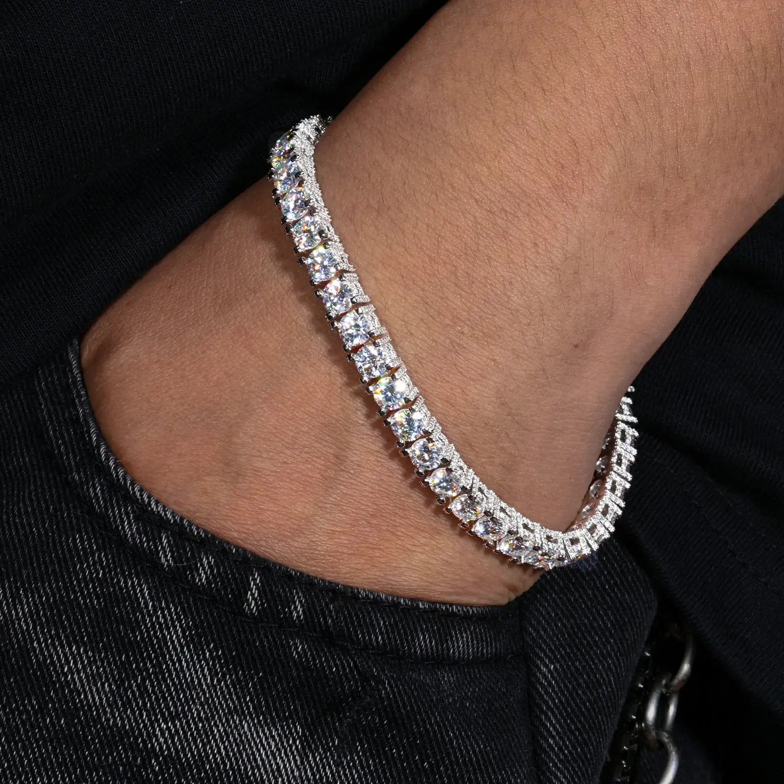 Male model wearing white gold 5mm 925 sterling silver moissanite full iced tennis bracelet in formal style — durable 925 silver, diamond-like moissanite brilliance, elevates upscale looks
