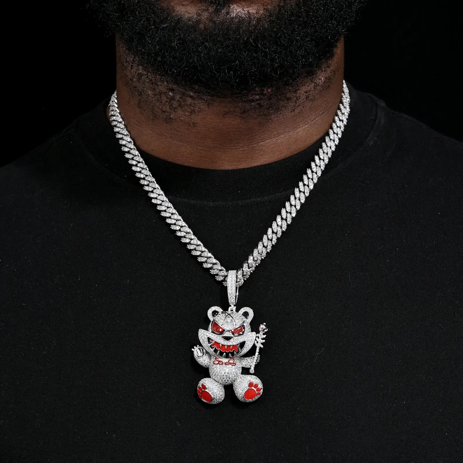 Male model wearing white gold 925 sterling silver moissanite evil bear pendant with Cuban link — hypoallergenic, diamond-like sparkle street luxury