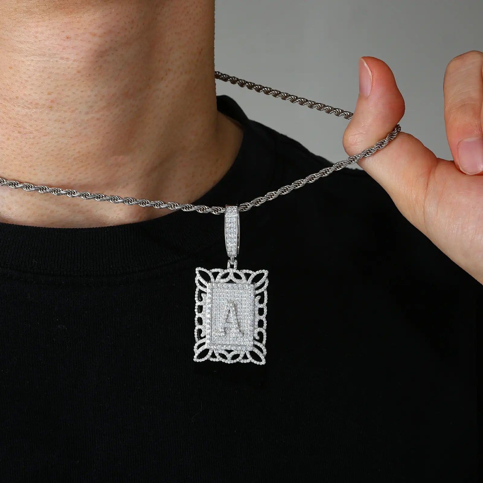 Male model wearing white gold 925 sterling silver moissanite Letter A square dog tag pendant with twist chain — hypoallergenic 925 silver, personalized Letter A design, moissanite sparkle for streetwear