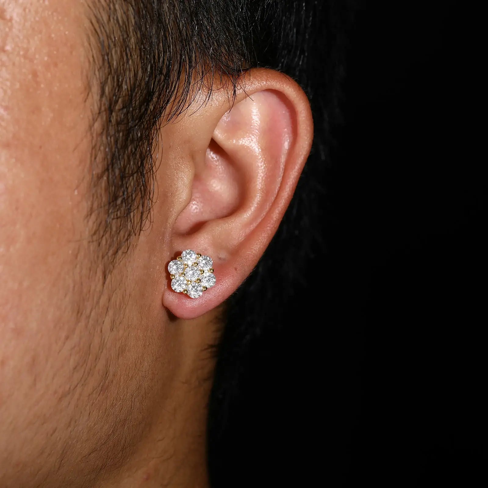 Model wearing gold 925 sterling silver floral radiance 7-stone flower stud earrings — showcases everyday wearability, moissanite sparkle, hypoallergenic 925 silver