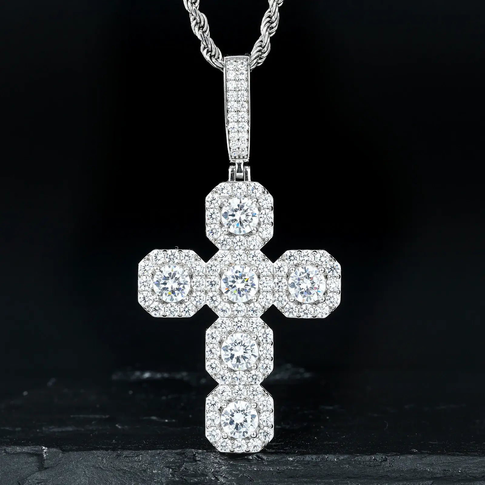 White gold 925 sterling silver moissanite square halo cross pendant hanging on black table — showcasing square halo design, moissanite’s diamond-like fire, 925 silver craftsmanship