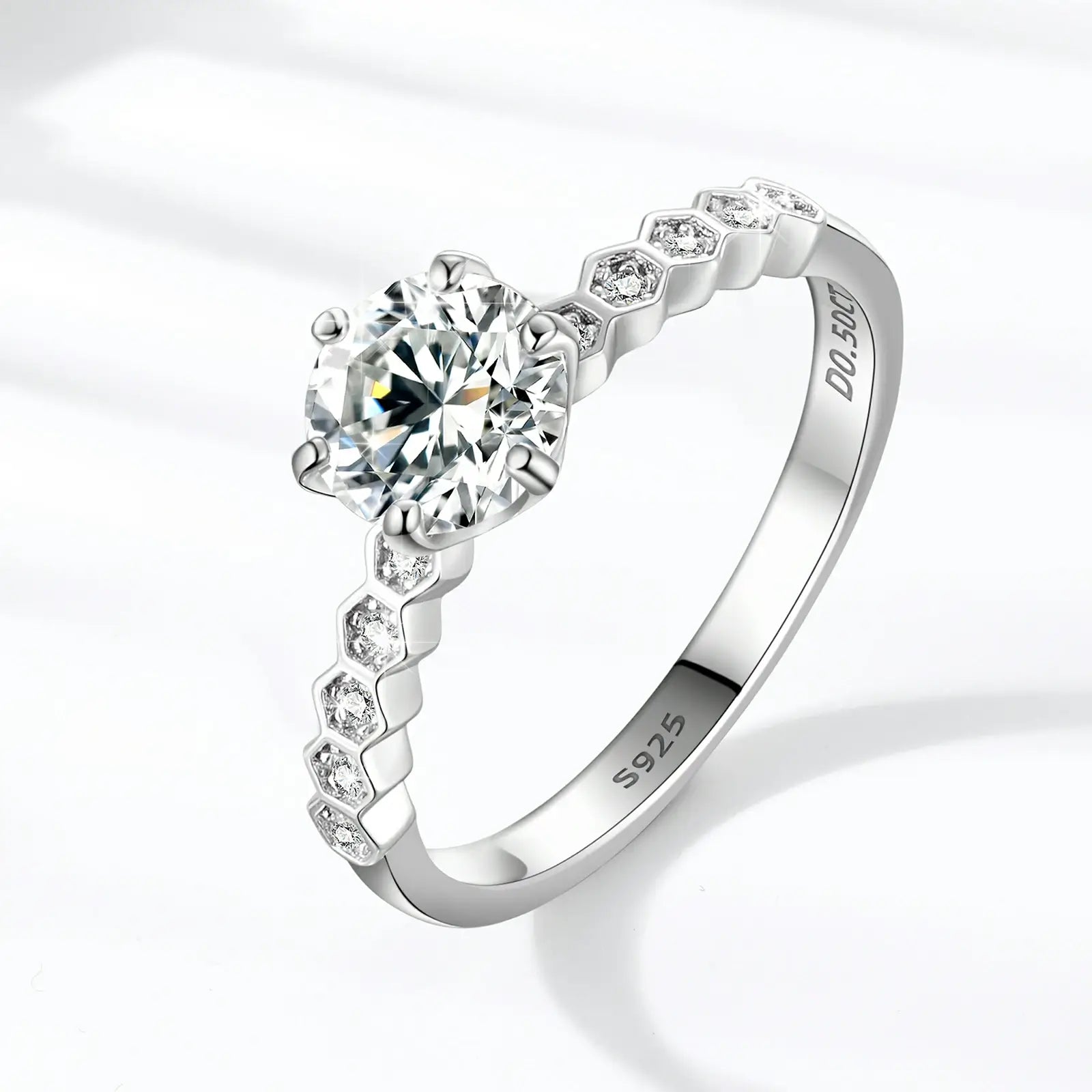 White gold S925 moissanite eternal nine stars engagement ring standing on white table — showcasing celestial band design, 1ct moissanite brilliance