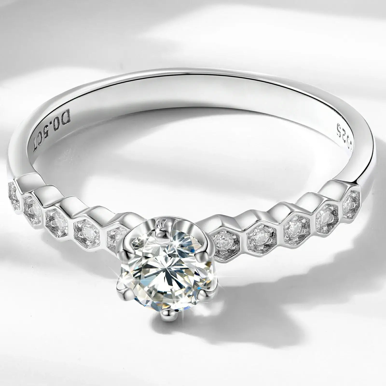 Close-up of white gold S925 moissanite eternal nine stars ring 1ct stone — moissanite fire, diamond-like brilliance, celestial cut