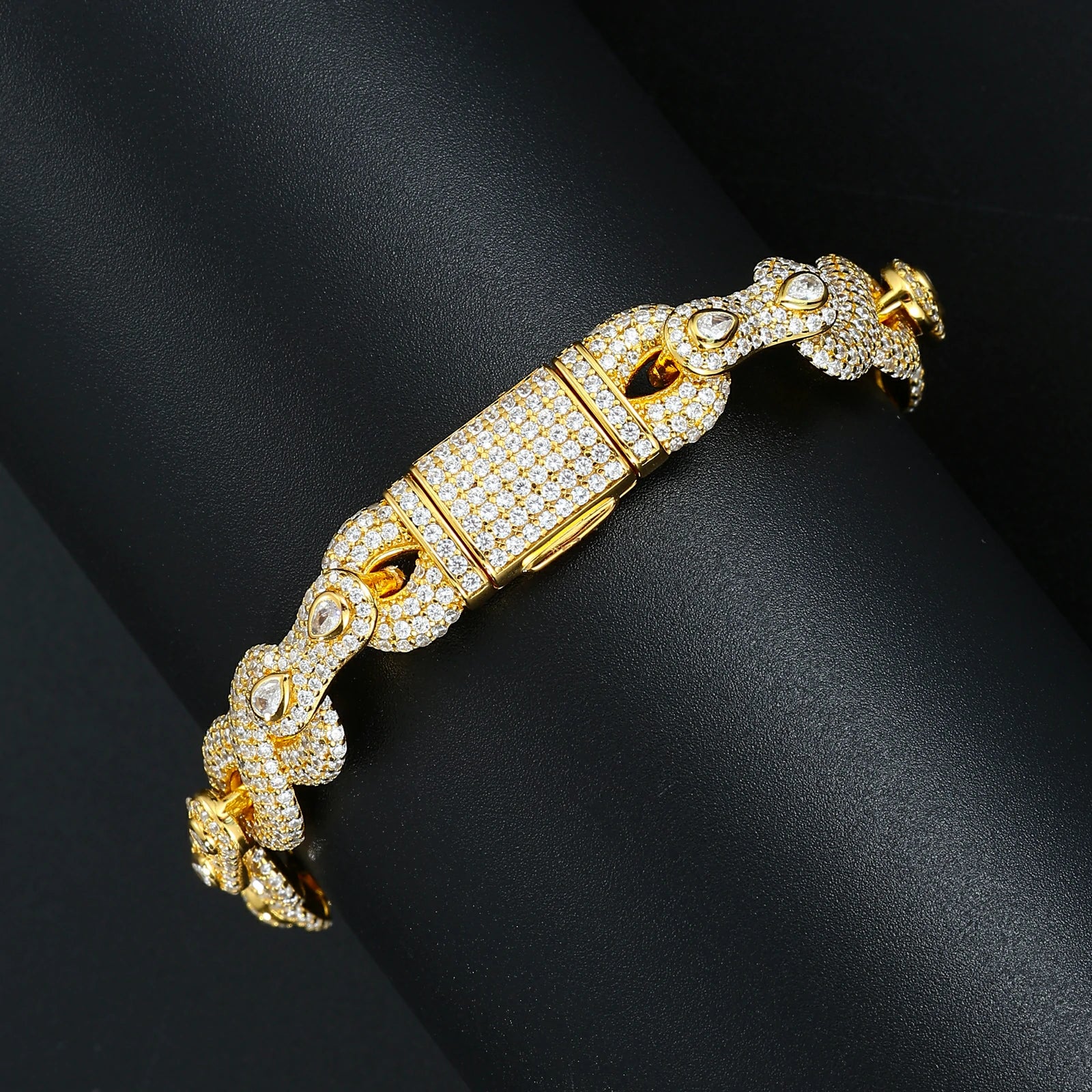 Close-up of yellow gold 10mm 925 sterling silver moissanite peanut infinity link bracelet clasp — secure fit, moissanite detailing, 925 silver build