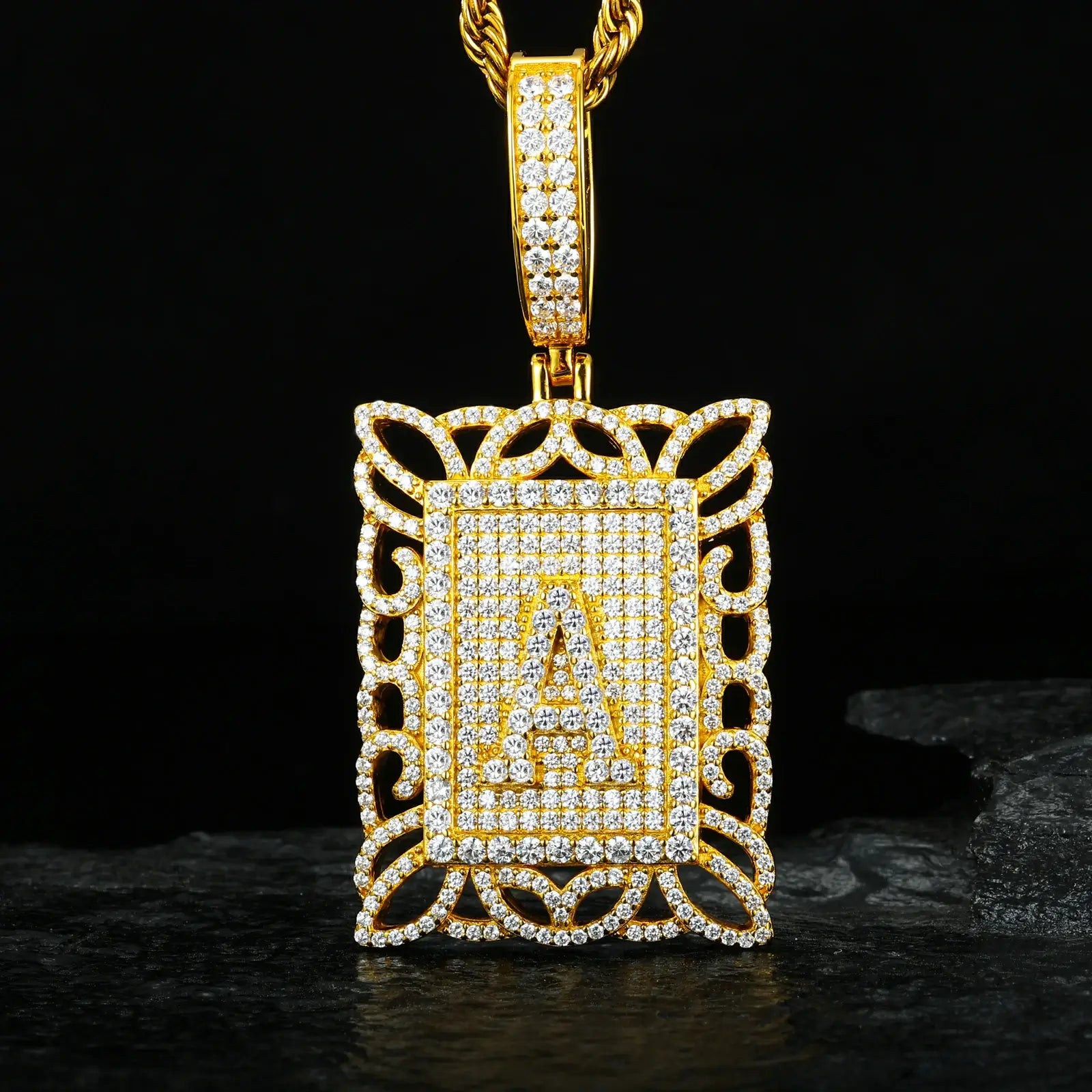 Yellow gold 925 sterling silver moissanite Letter A square dog tag pendant hanging on black table — showcasing square dog tag shape, Letter A detail, moissanite’s diamond-like fire