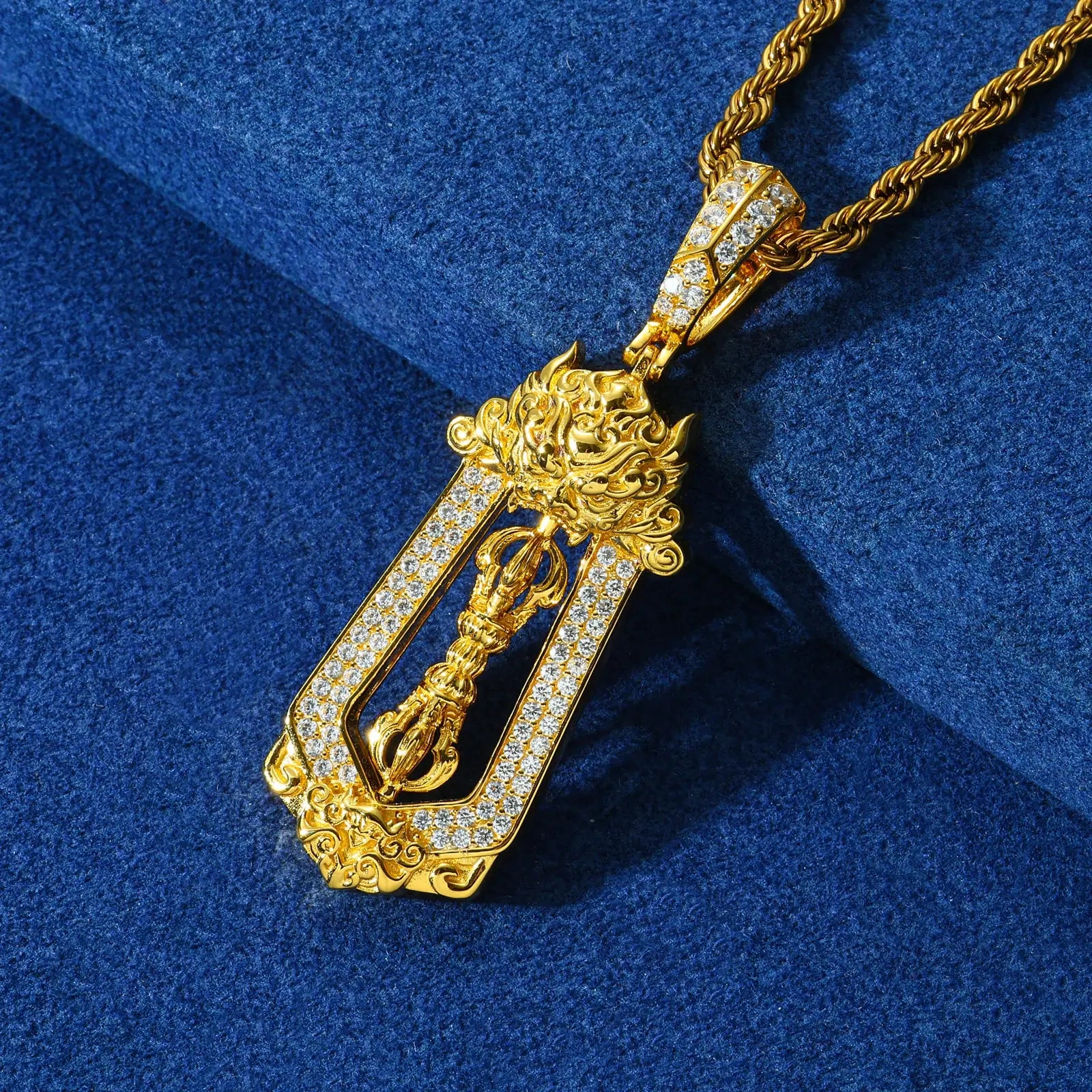 Close-up of yellow gold 925 sterling silver moissanite brave troops vajra pendant on blue table — highlighting moissanite detailing, vajra texture, 925 silver craft