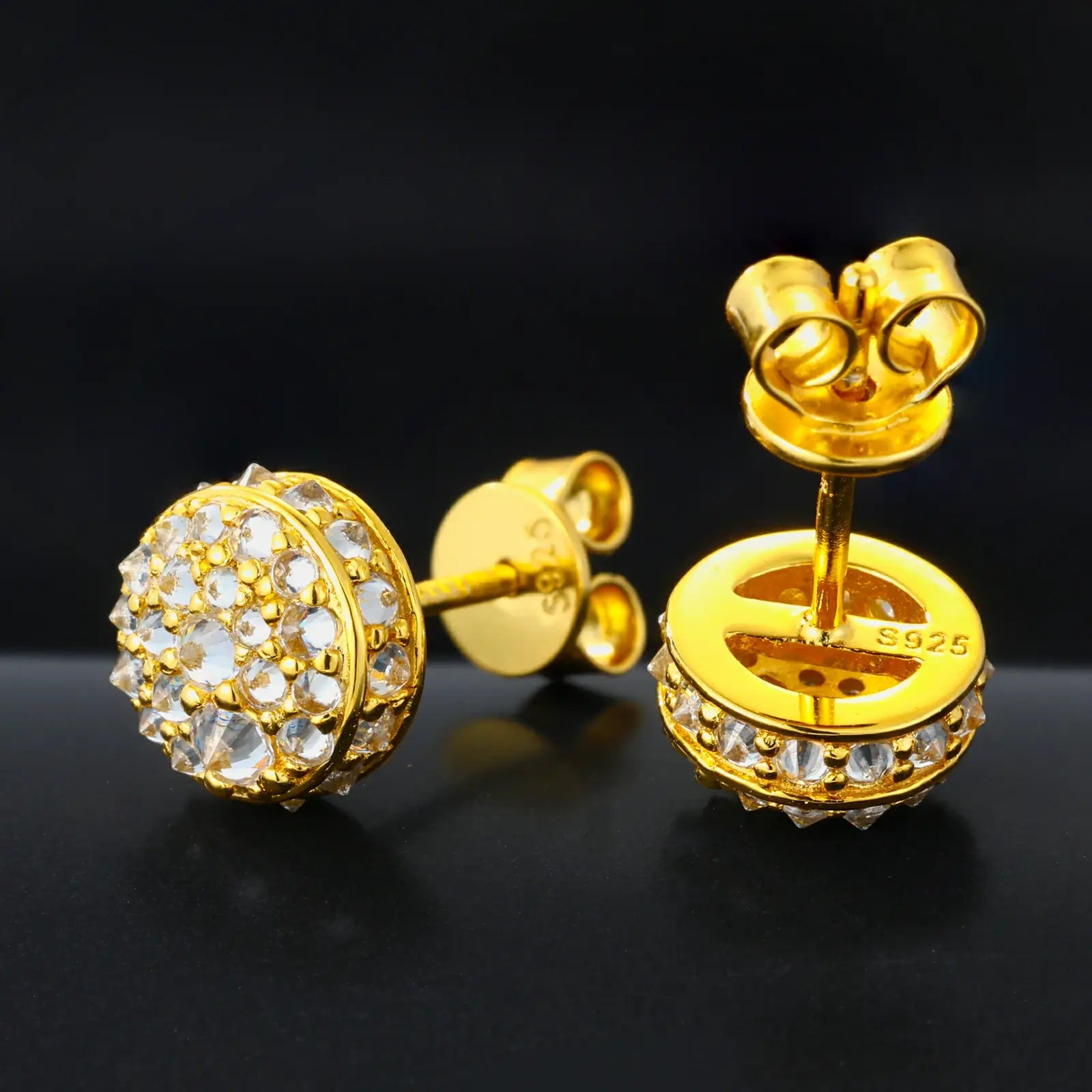 Back close-up of yellow gold 925 sterling silver moissanite thorns stud earring on black table — showcasing 925 silver post, secure backing, thorn design from behind