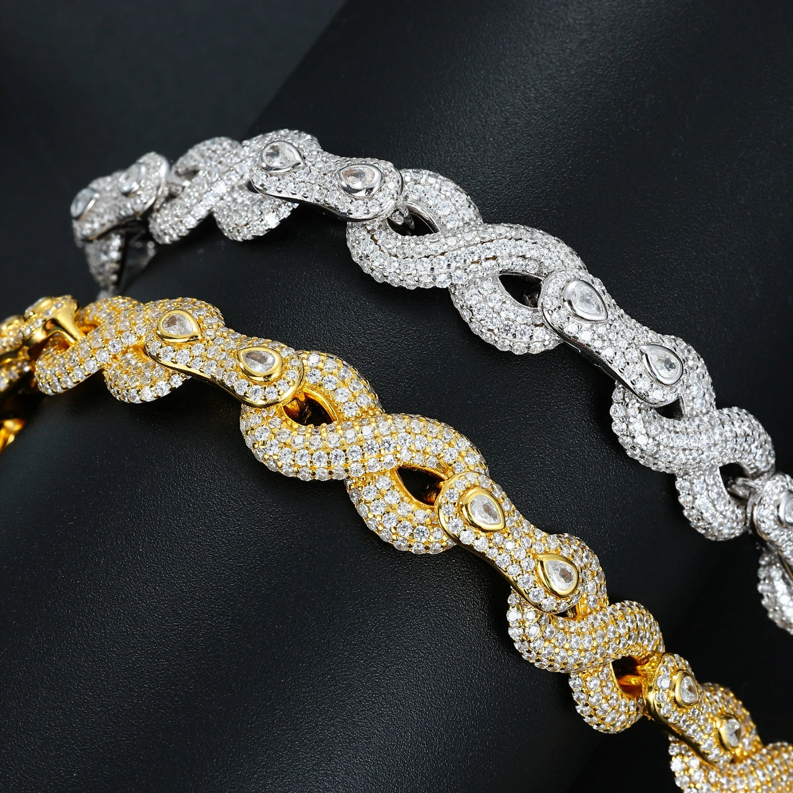 Close-up of yellow & white gold 10mm 925 sterling silver moissanite peanut infinity link bracelets — showcasing moissanite-encrusted peanut links, 925 silver detail