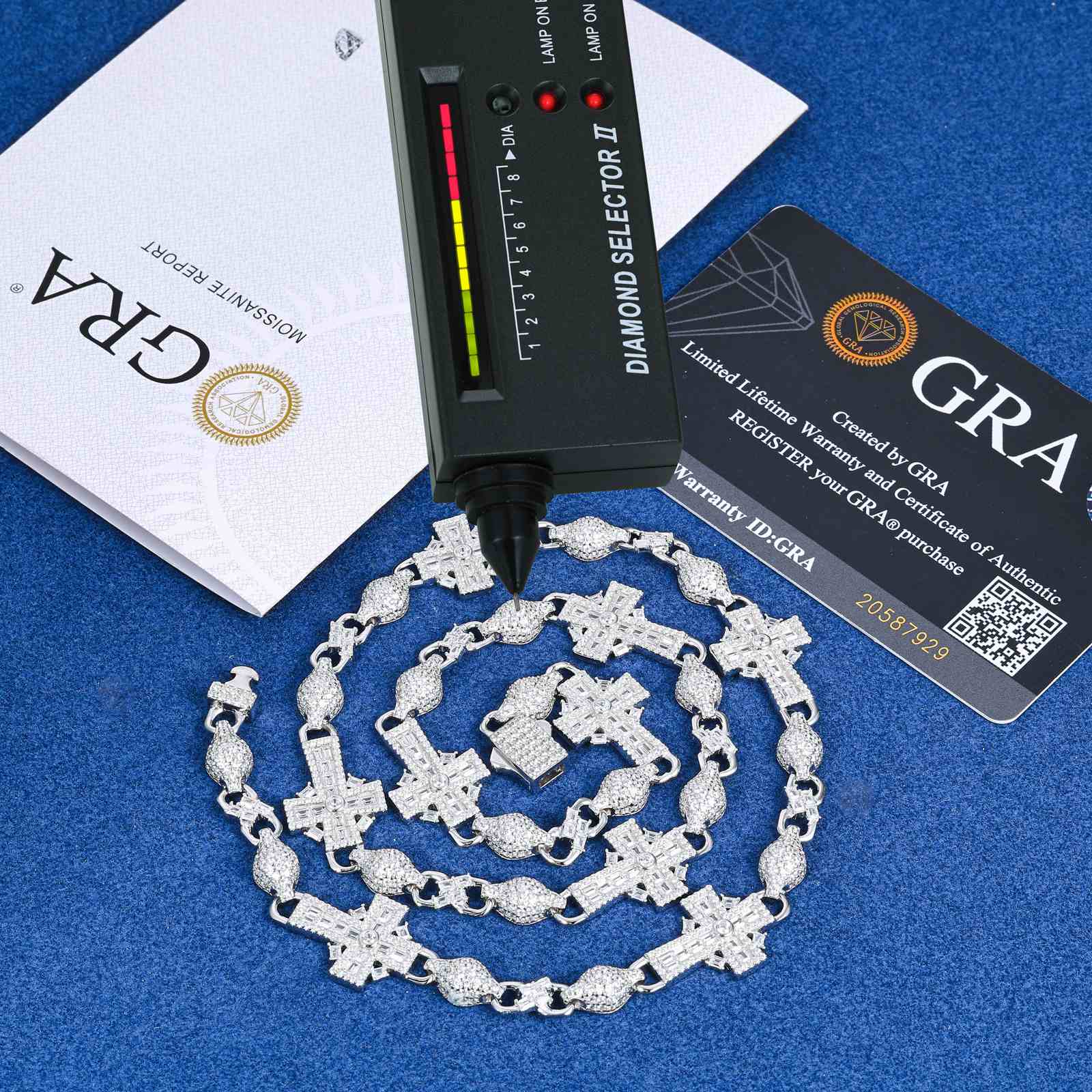 Lab-certified baguette moissanites on white gold chain under UV light, demonstrating 2.4x higher refraction than cubic zirconia.