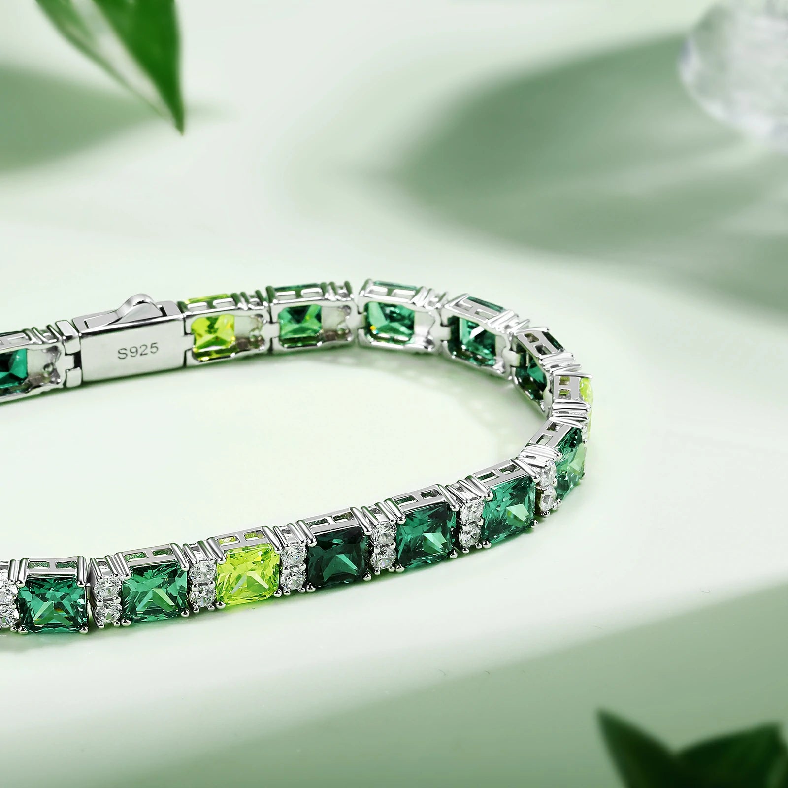 Macro shot: VVS Asscher moissanites in emerald-jade spectrum | 2.65 refractive index sparkling brighter than diamonds