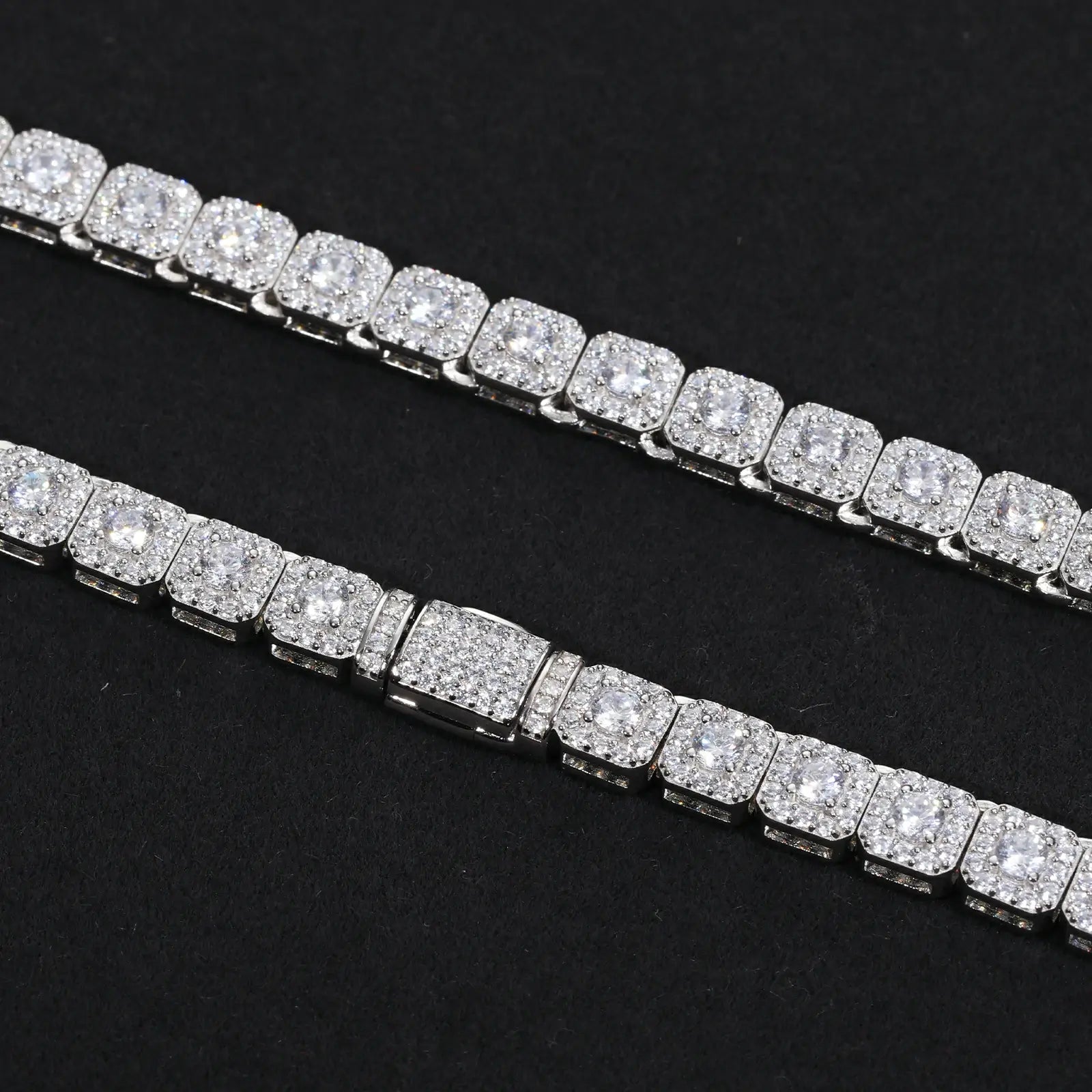 Close-up: Security clasp and chain links - 6mm square halo moissanites on S925 silver | Salt-proof construction