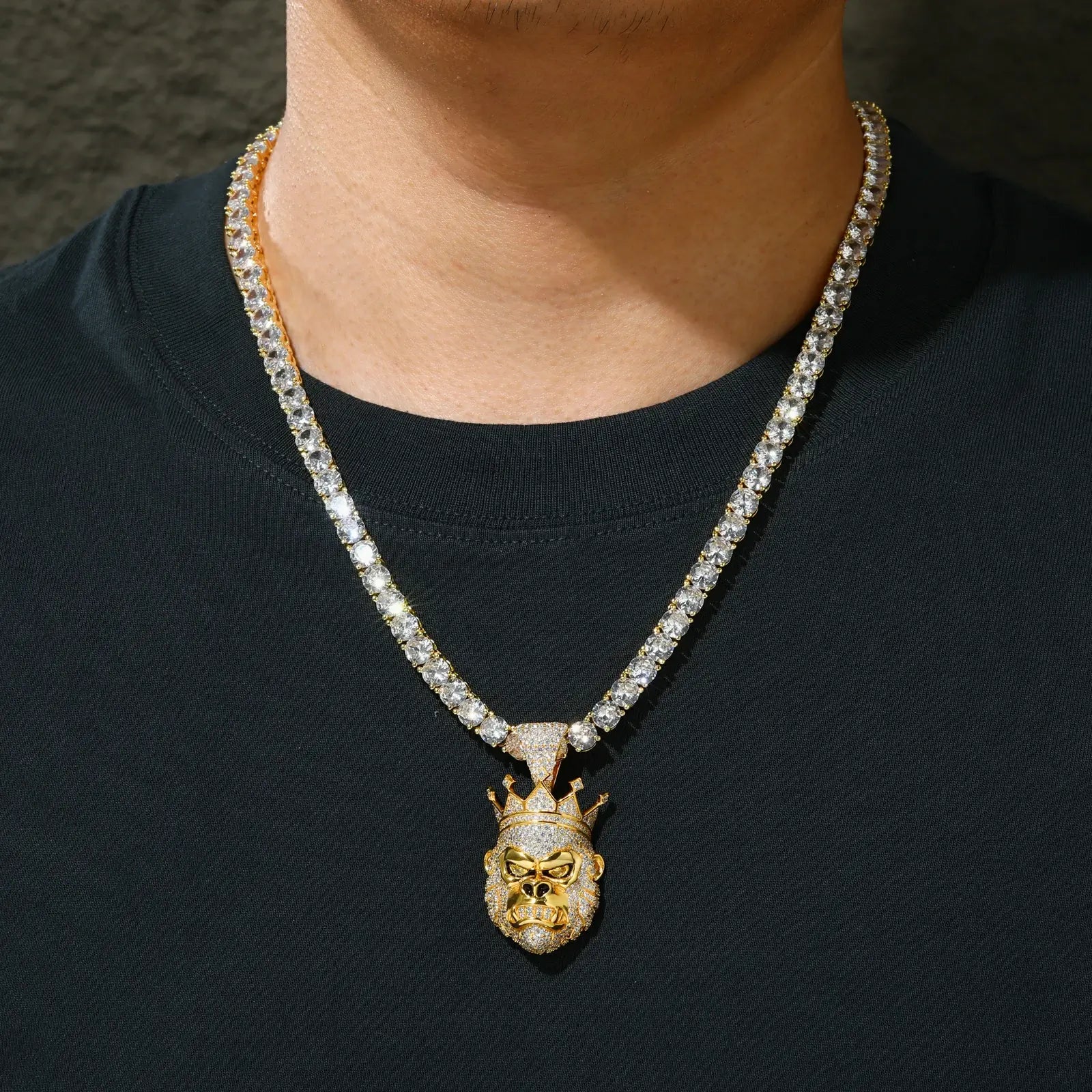 Male fashion influencer wearing gold gorilla king pendant on tennis chain - luxury S925 sterling silver moissanite necklace