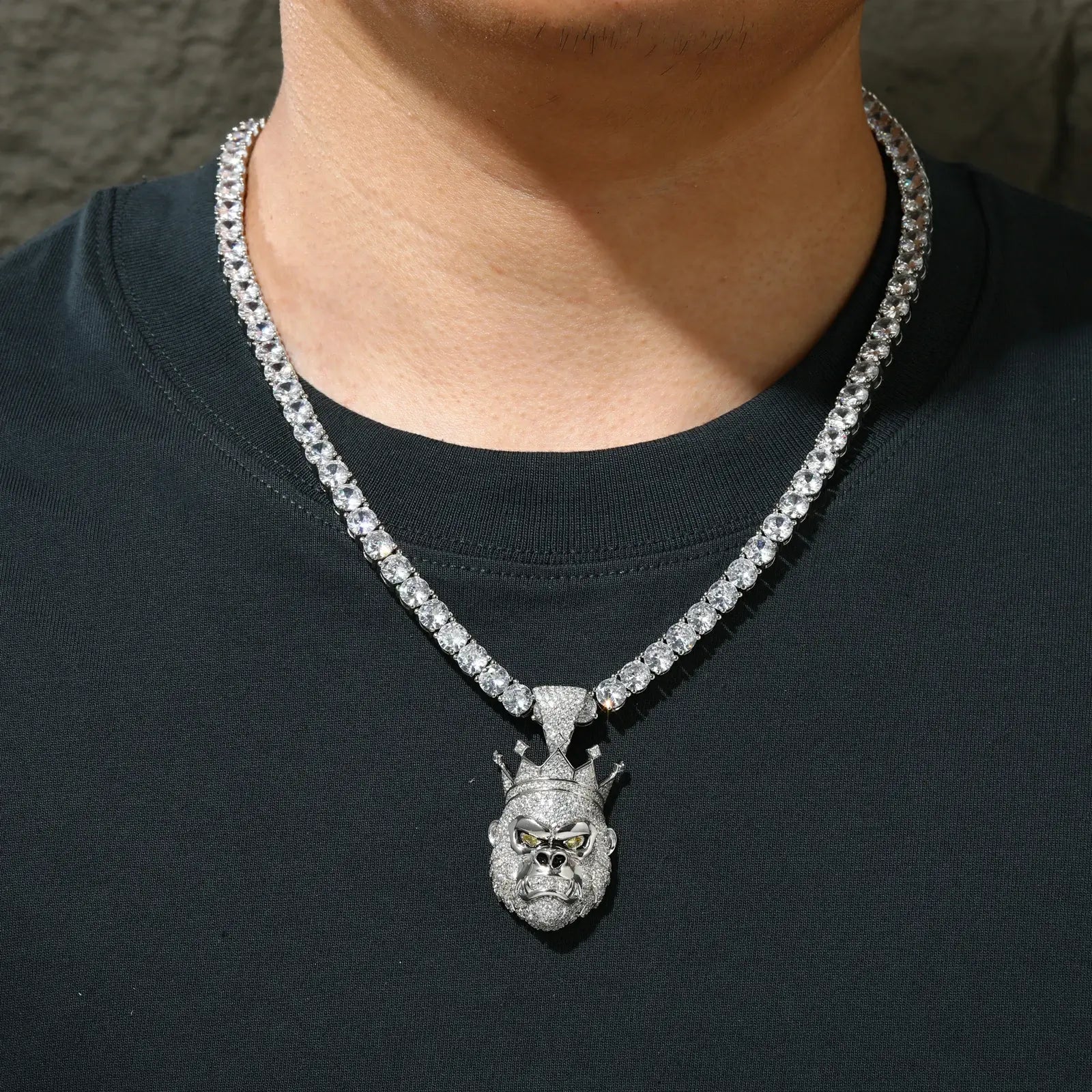 Male model wearing white gold gorilla king pendant with tennis chain - urban luxury S925 silver moissanite jewelry for men