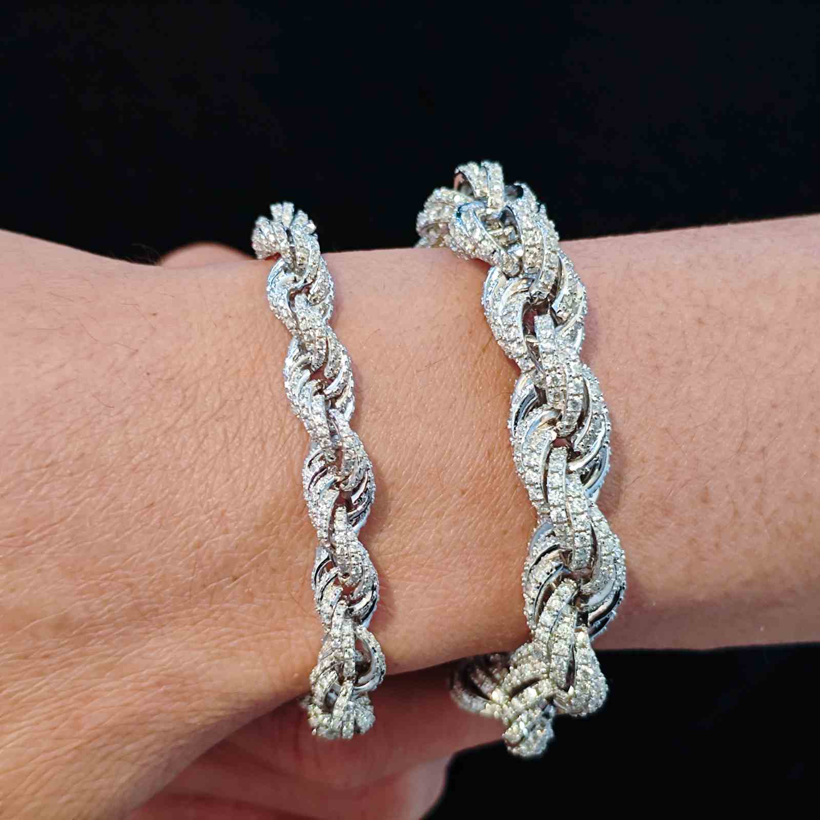 Stylish male model showcasing stacked 8mm and 12mm white gold-plated S925 rope bracelets with lab-grown Moissanite stones. Perfect for bold hip-hop streetwear looks. Fade-resistant plating and diamond-tested quality.