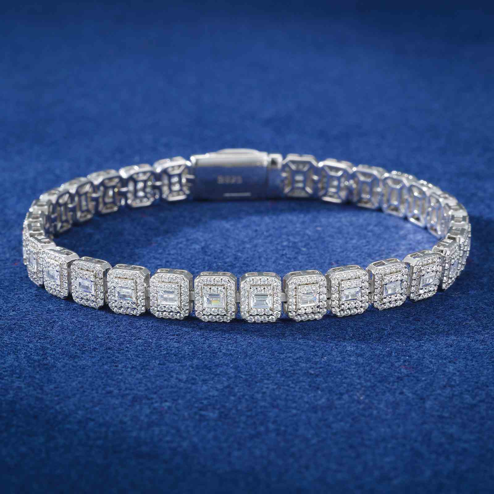 7.5mm S925 Baguette Moissanite Cluster Bracelet on navy marble, showcasing full-pave brilliance under studio lighting for luxury streetwear