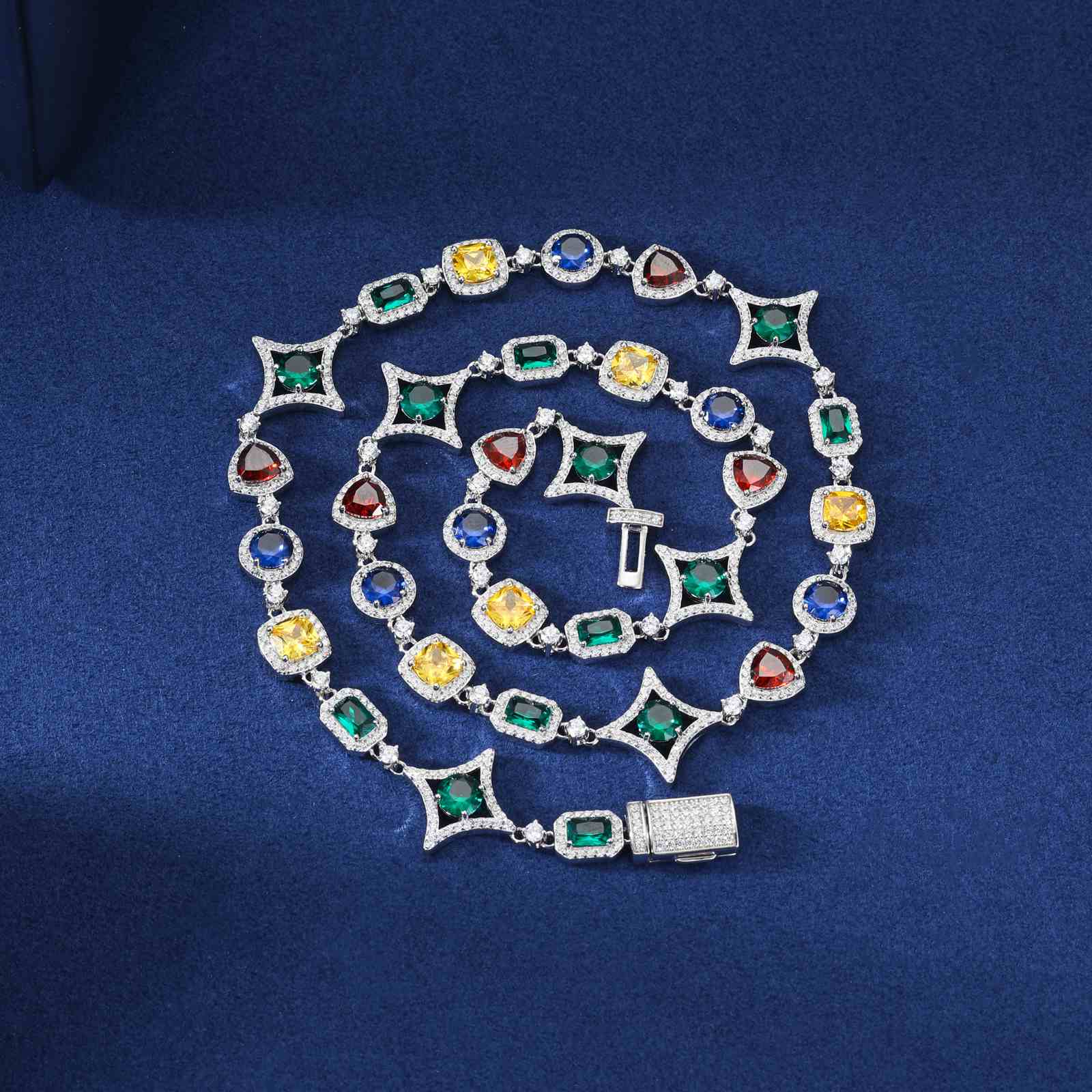 17mm S925 Colored Star Halo Tennis Chain displayed on navy marble, with red/blue zirconia stars and moissanite halo glowing under studio lighting