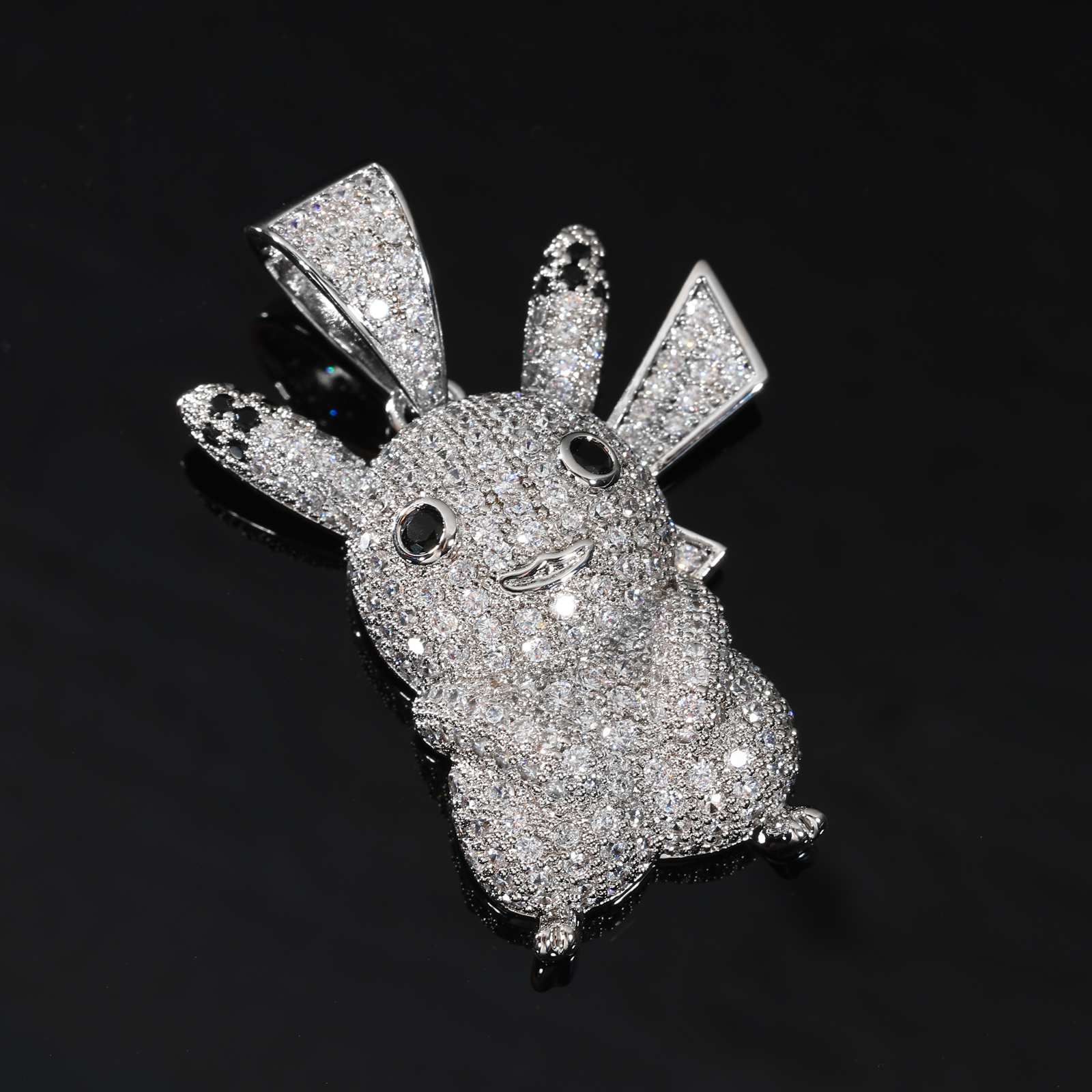 Close-up of Pikachu pendant’s face, with glossy black gem eyes and hand-set moissanite accents for anime-accurate luxury.