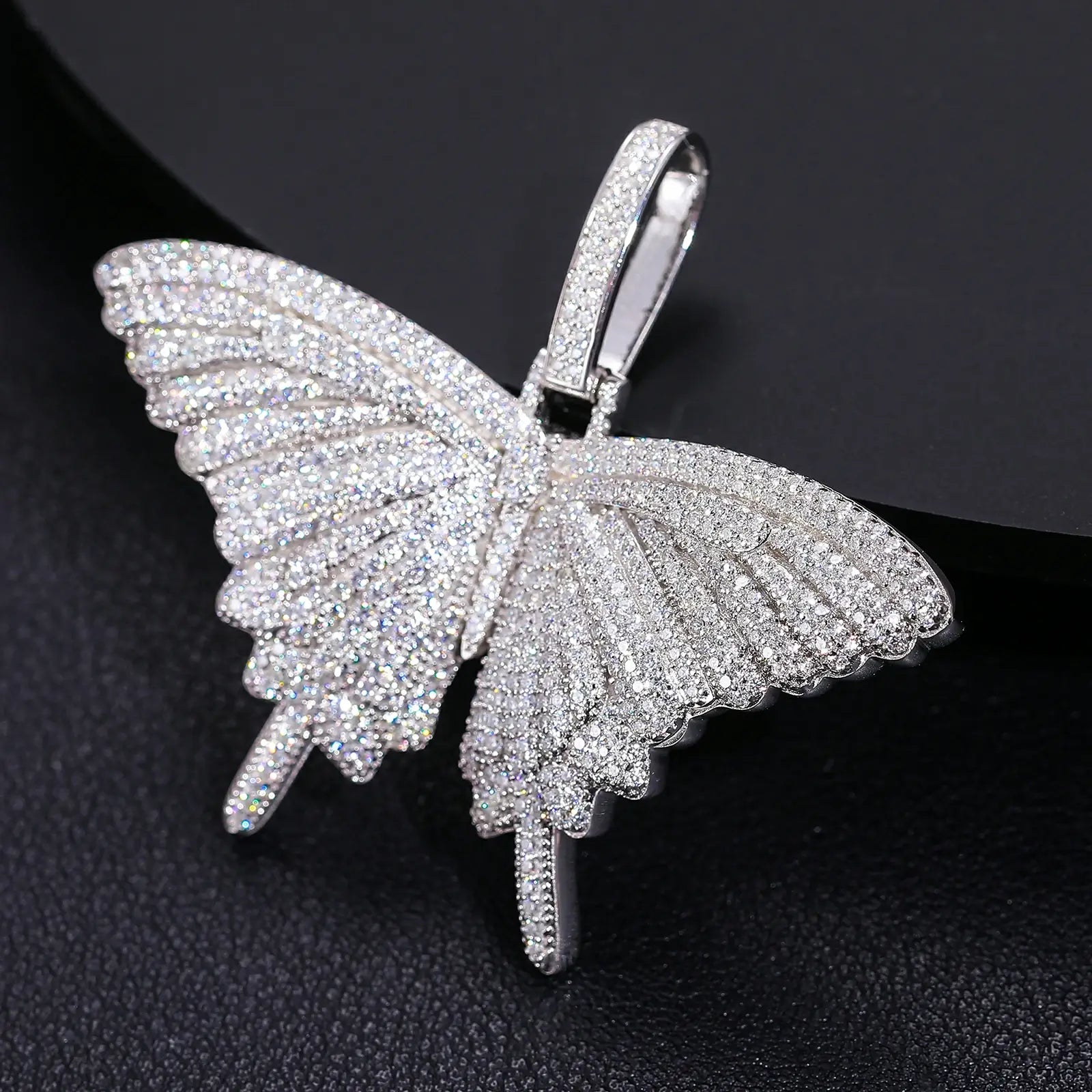 Profile shot: 3D butterfly pendant on black - dimensional wings with textured moissanite scales | Salt-resistant S925 craftsmanship