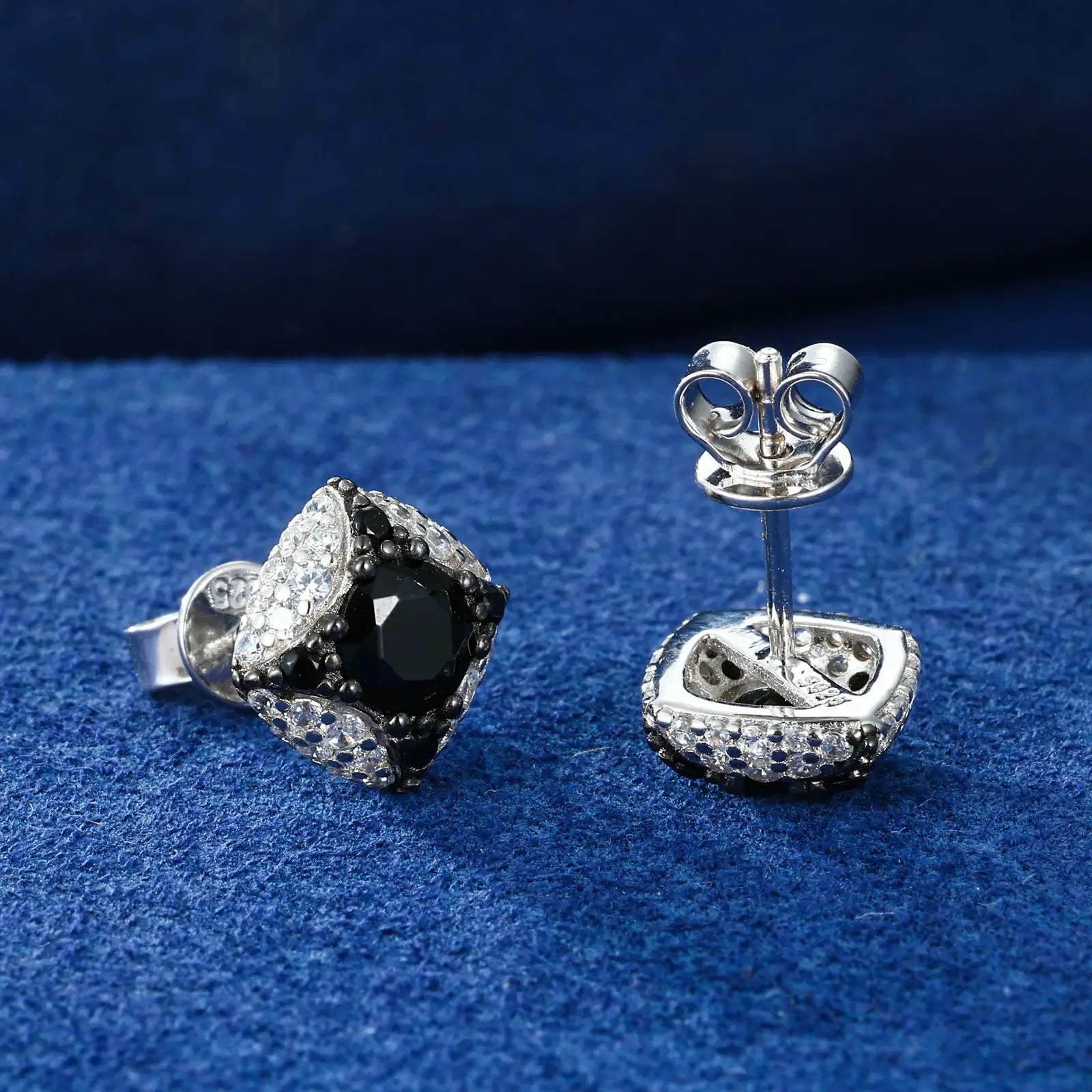 Profile shot: 3D star earrings on blue - geometric points with moissanite accents | Tarnish-proof S925 craftsmanship