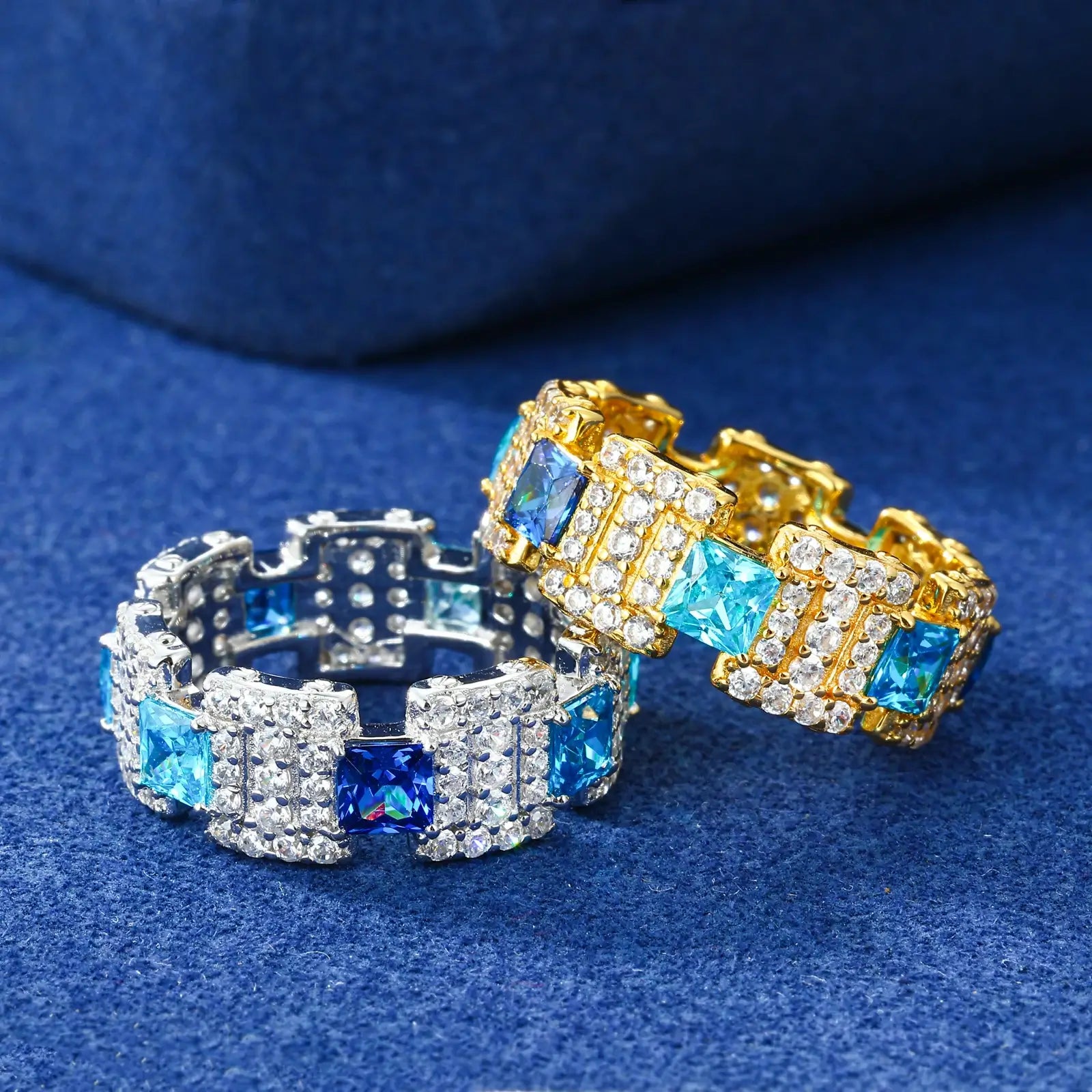 White and gold ocean band rings stacked on blue surface - gradient moissanite wave design | Tarnish-proof S925 silver jewelry set