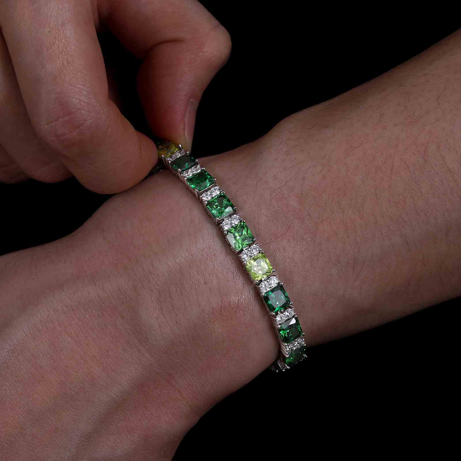 Men’s fashion-forward green gradient tennis bracelet, highlighting scratch-resistant gold plating and bold geometric Asscher diamonds for urban luxury