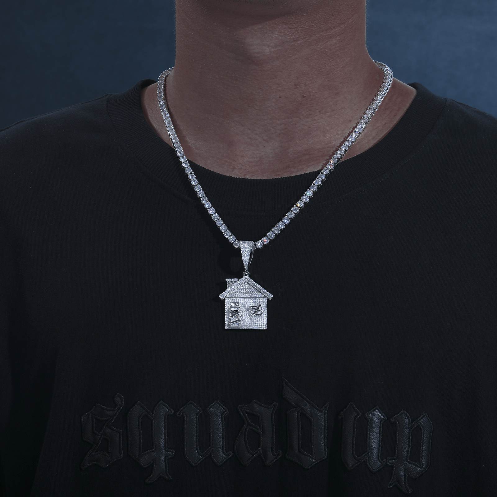 Stylish man wearing white trap house pendant on tennis chain - S925 hypoallergenic core | Street-to-suite waterproof statement