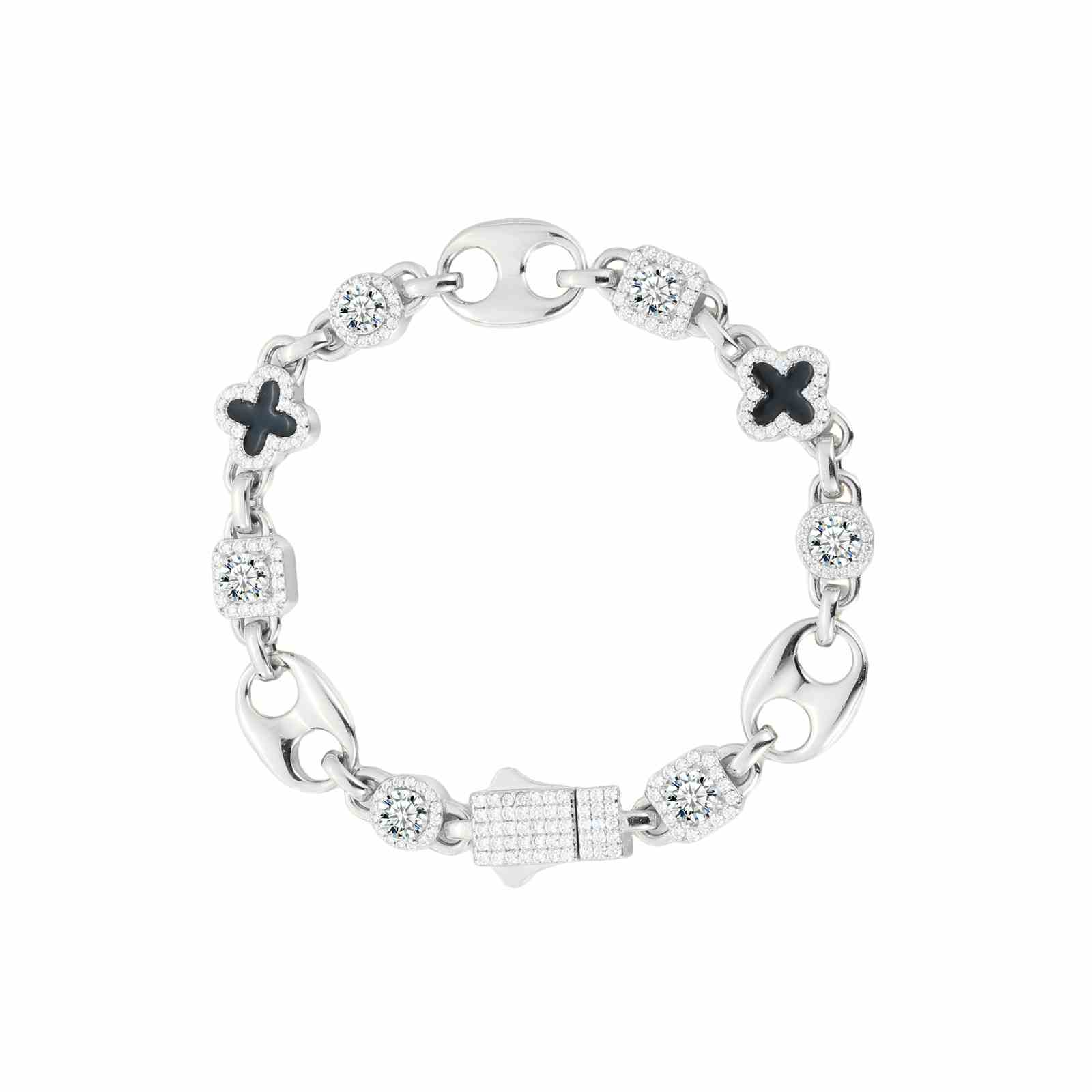 Flatlay of white gold bracelet showing alternating moissanite links and enamel clovers, engineered for street-smart durability