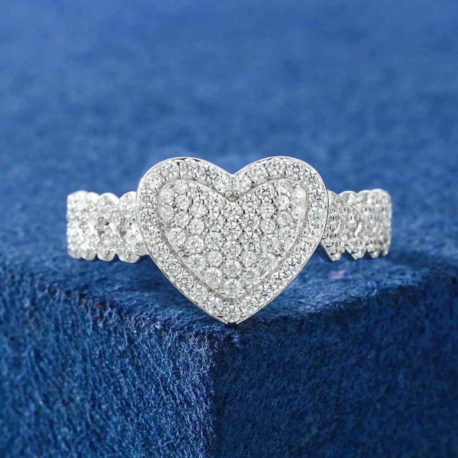 Front view: White gold Cuban-side heart ring on Mediterranean blue table - double-layer 11.50 CT moissanite design | Waterproof S925