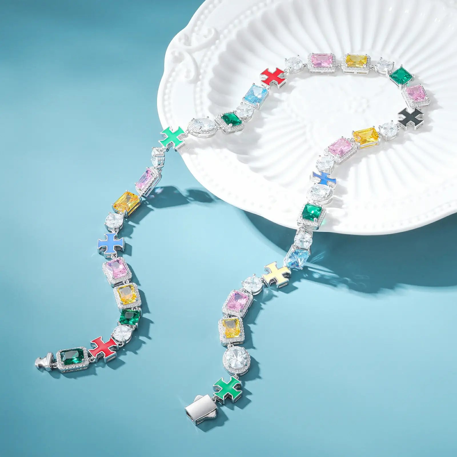 10mm tennis chain on mint surface - enamel cross pendants with ruby, emerald and sapphire gemstones | Tarnish-resistant S925 silver