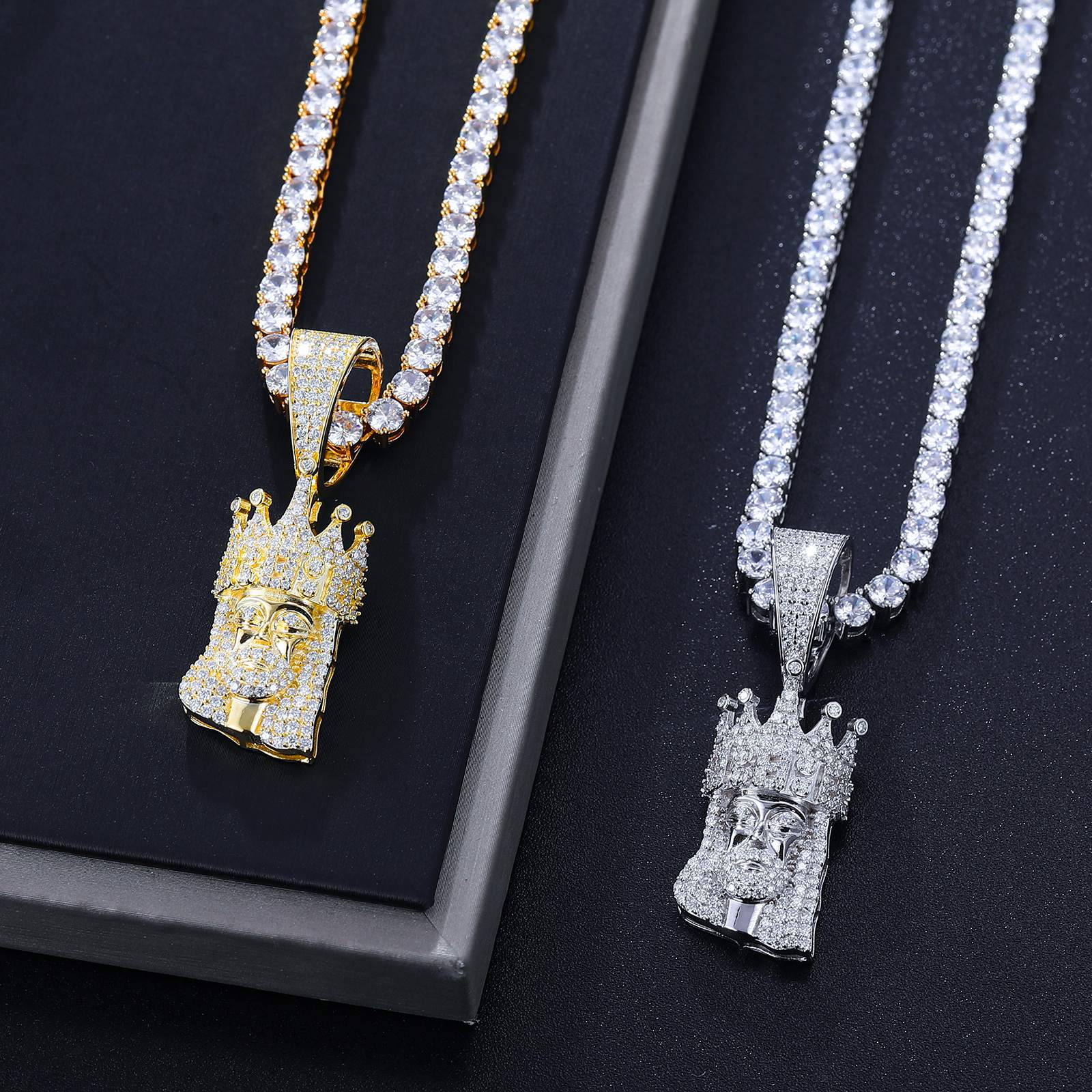 White gold & gold Jesus pendants side-by-side - identical 42 VVS moissanites in crown | ISO 9227 tarnish-proof certification
