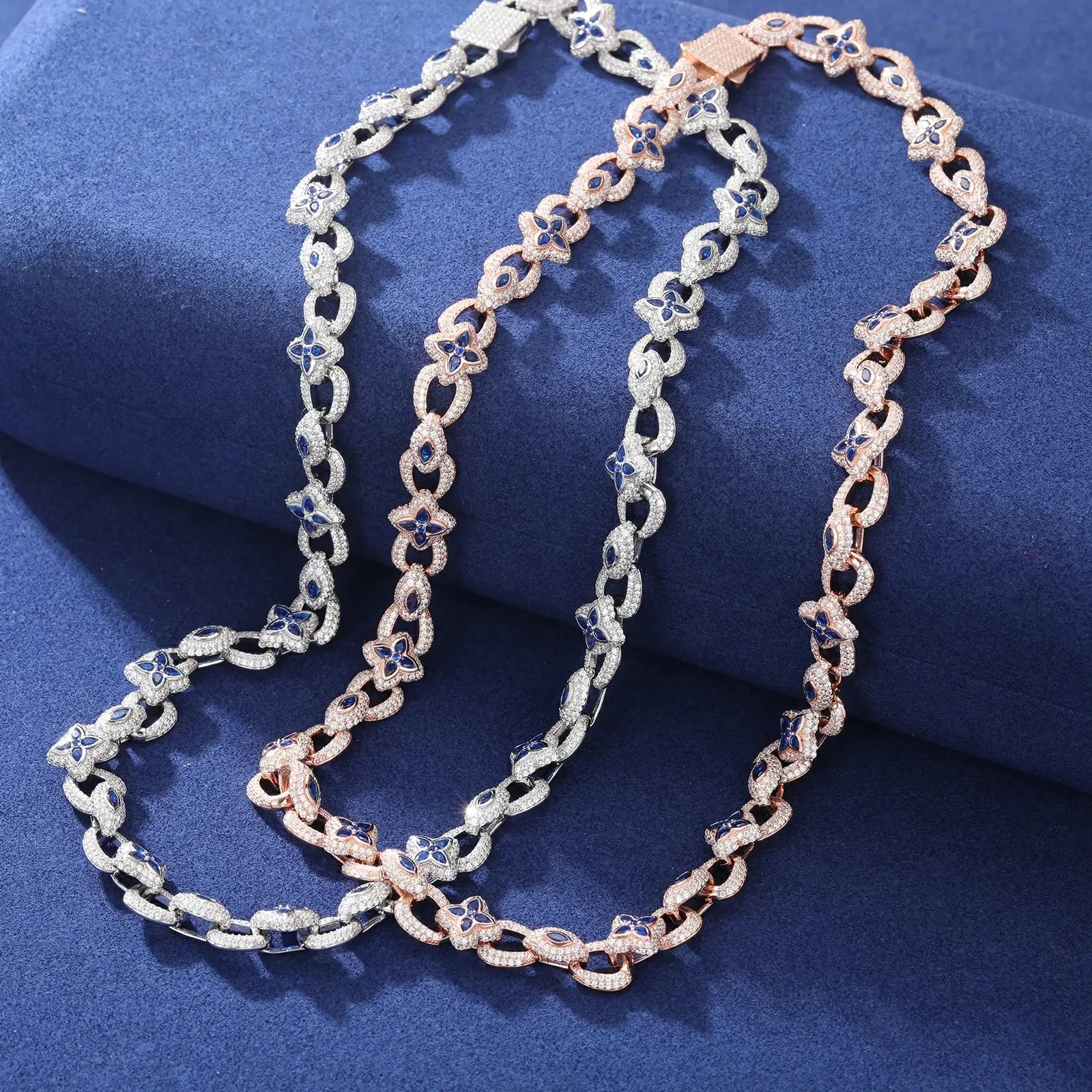 White and rose gold chains on blue surface - 10mm evil eye & clover links | Waterproof S925 silver construction