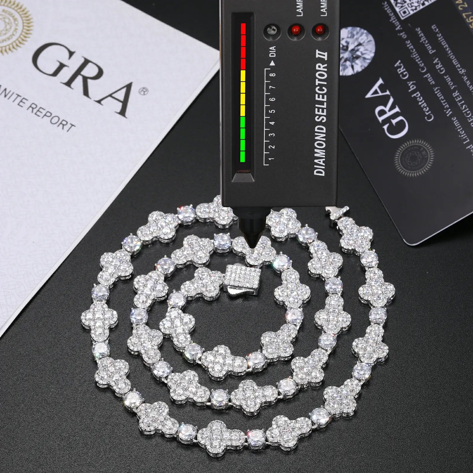 Diamond tester and GRA certificate verifying 10mm moissanite cross tennis chain - authentic 925 sterling silver with diamond alternative properties