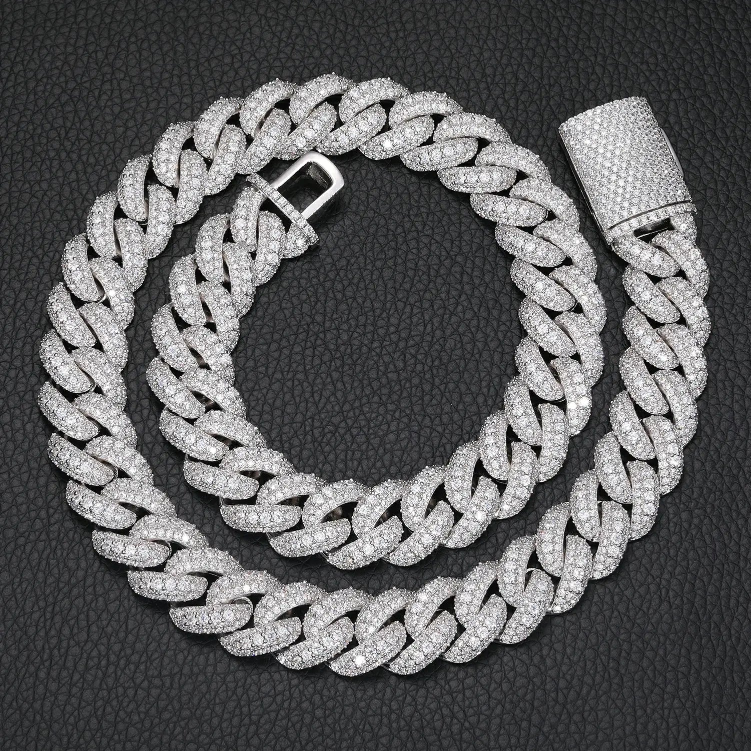 Full-length view of a 15mm white gold Cuban chain with three rows of sparkling moissanite stones, highlighting its chunky yet refined design.