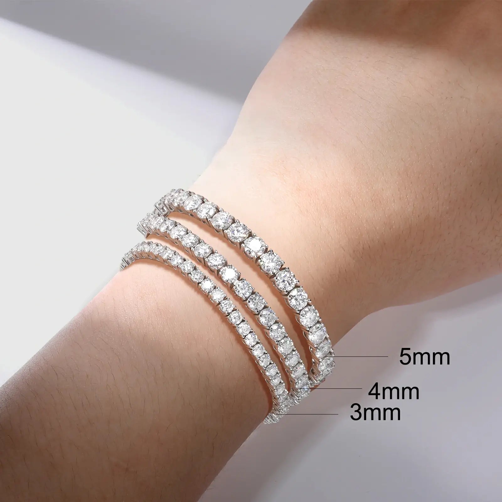 Size comparison on wrist: 3mm vs 4mm vs 5mm S925 tennis chains - model wearing spring buckle designs showing width differences
