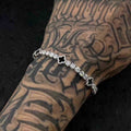 4mm 925 sterling silver moissanite tennis bracelet four leaf clover agate on tattooed arm — edgy styling, agate clover charm, moissanite brilliance, 925 silver craft