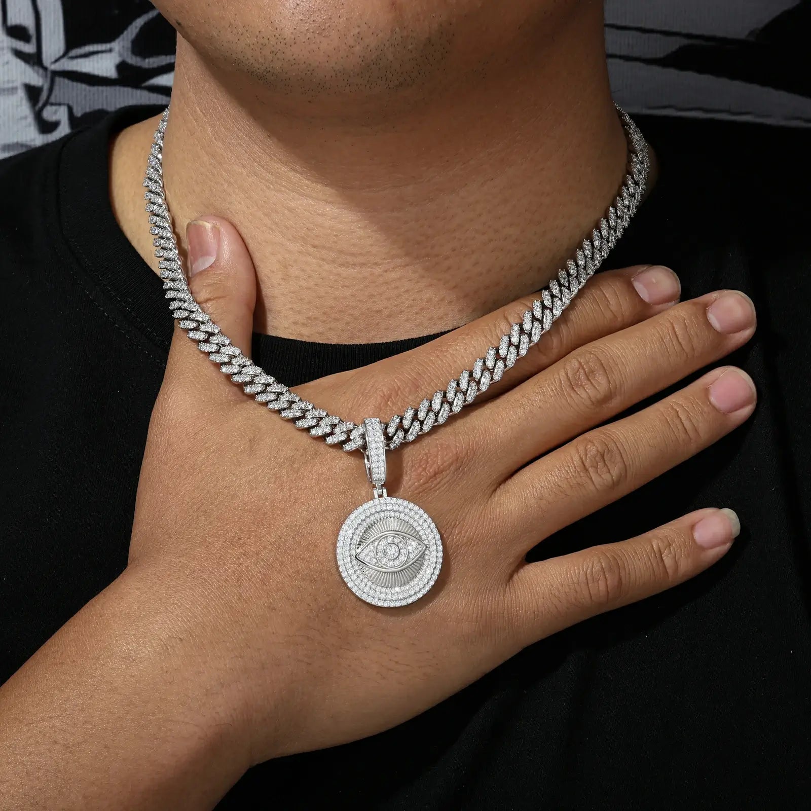Male model wearing 925 sterling silver moissanite evil eye sun dog tag pendant (white gold) with white cuban chain, men’s trendy luxury jewelry