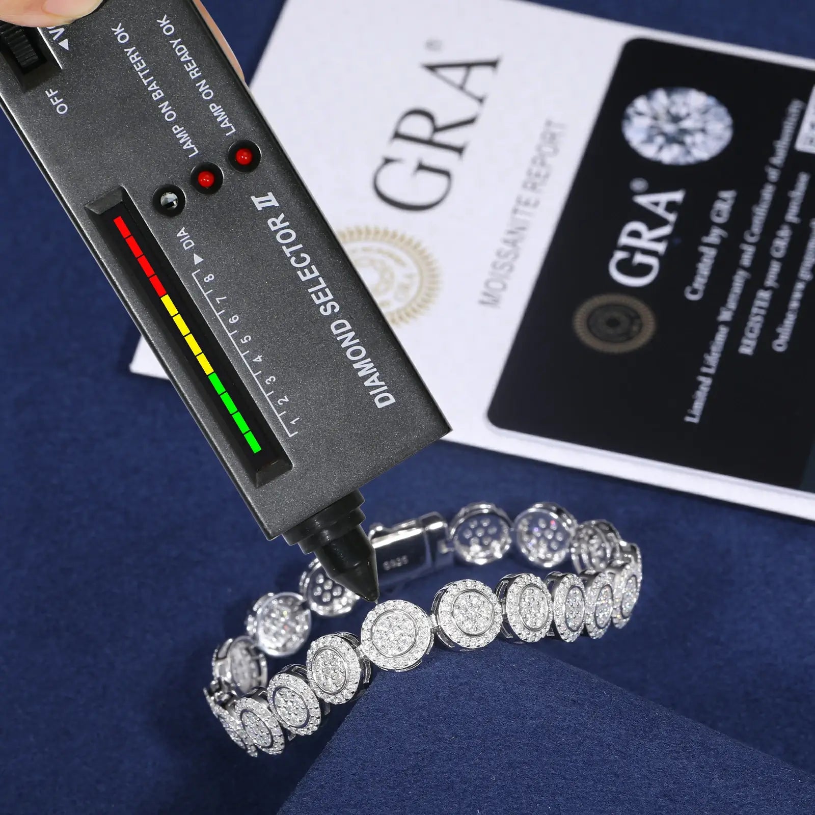 9mm white gold 925 sterling silver moissanite concentric circles link bracelet with diamond tester + GRA certificate on blue table — certified luxury jewelry