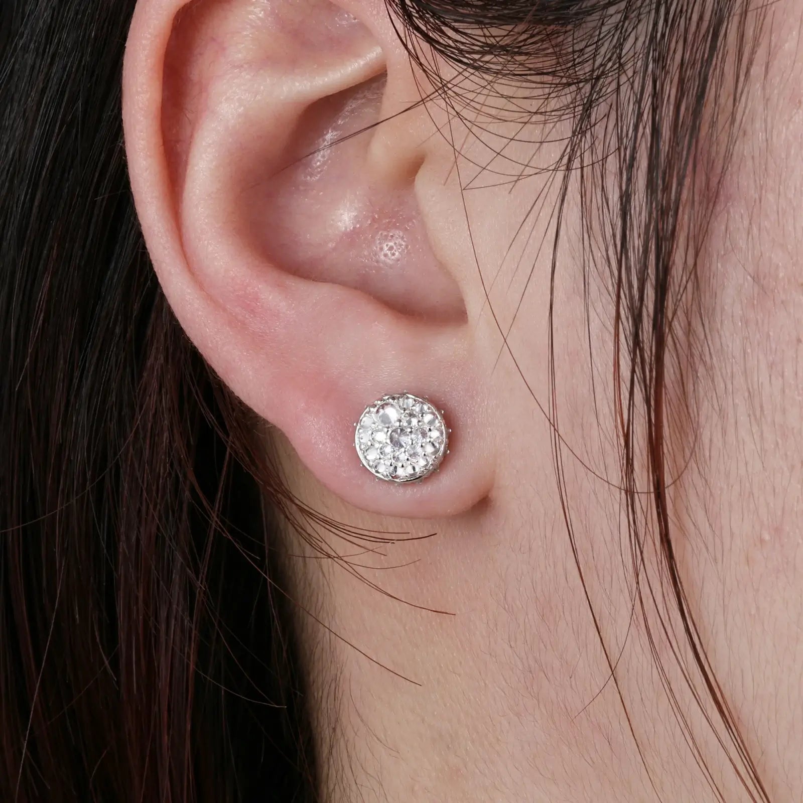 Female model wearing white gold 925 sterling silver moissanite thorns stud earrings — tarnish-resistant 925 silver, bold thorn motif, moissanite brilliance for trendsetting style