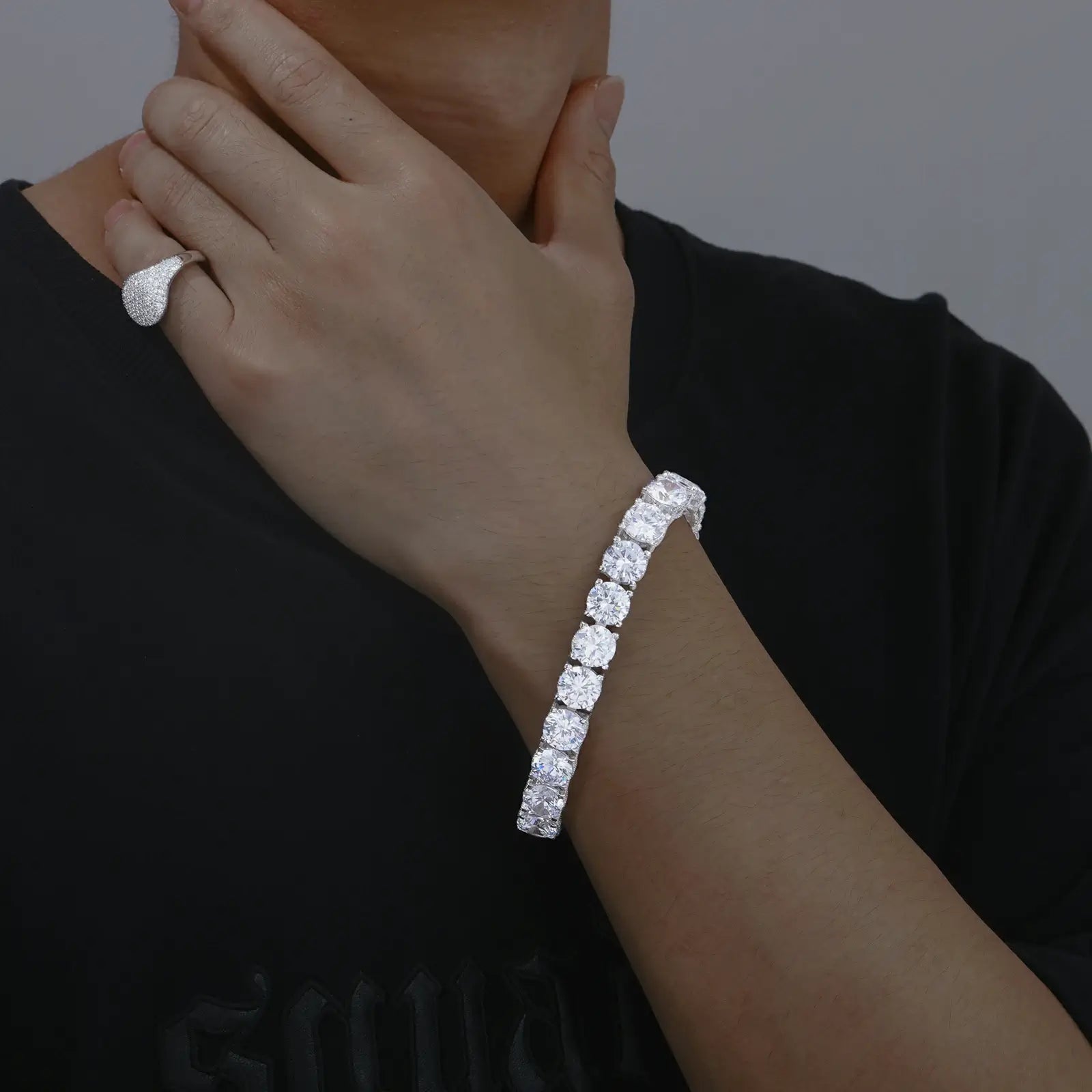 Male model styling 10mm white gold 925 sterling silver moissanite iced out tennis bracelet — trendy iced - out luxury jewelry