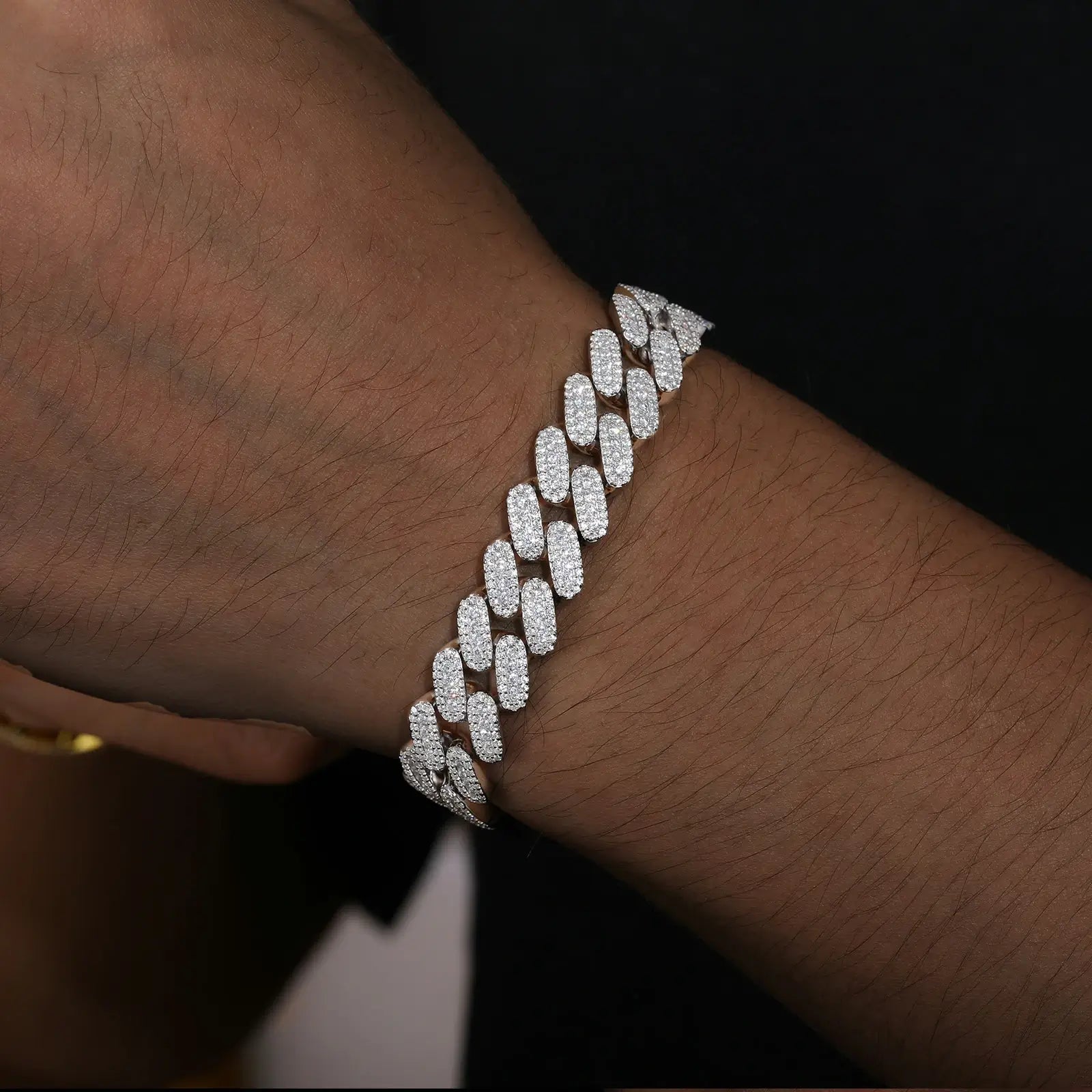 Male model wearing 12mm white gold 925 sterling silver 3 row moissanite Cuban link bracelet — hypoallergenic, rust-proof hip-hop luxury accessory