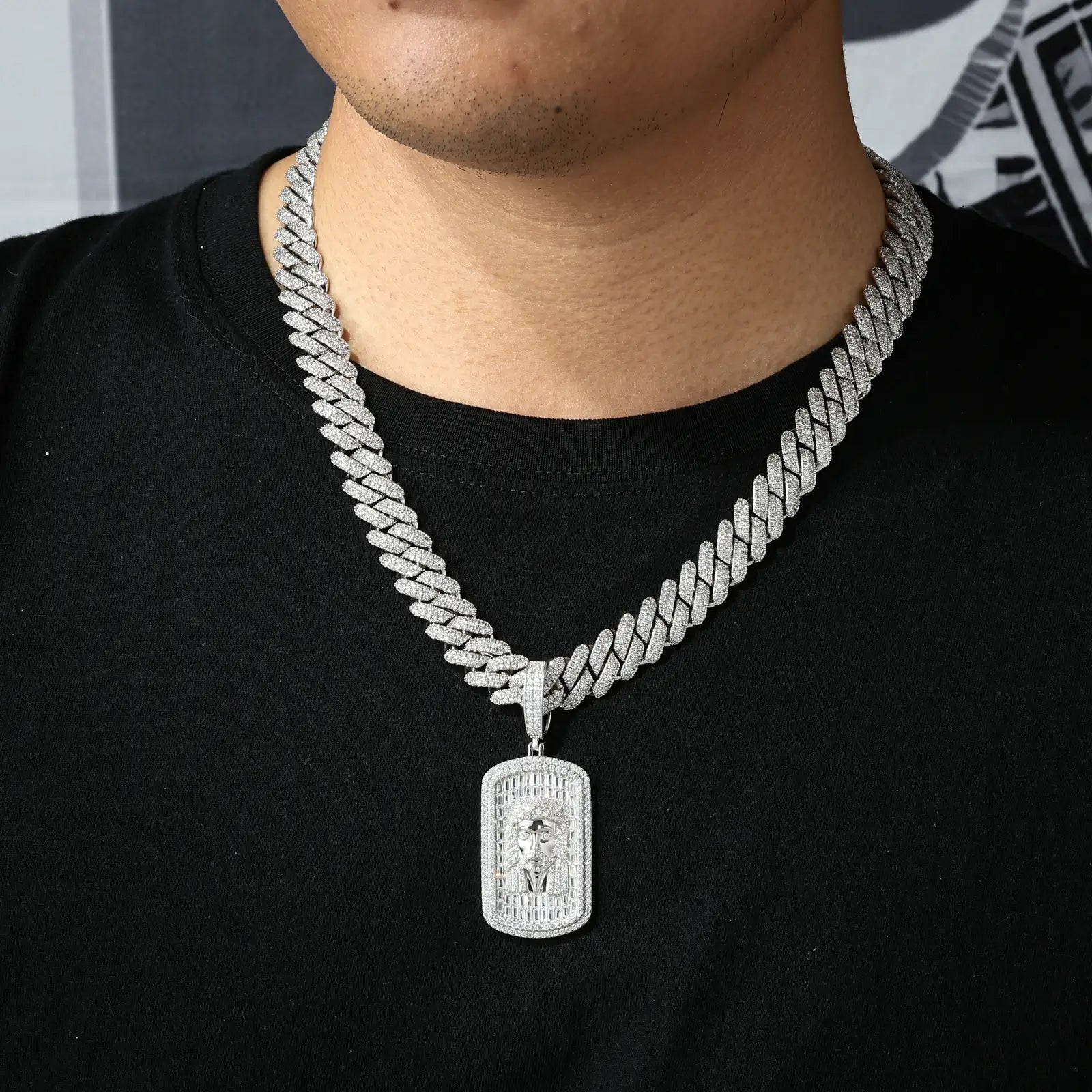 Male model wearing white gold 925 sterling silver baguette moissanite Jesus dog tag pendant with white cuban chain — men’s hypoallergenic trendy spiritual luxury jewelry
