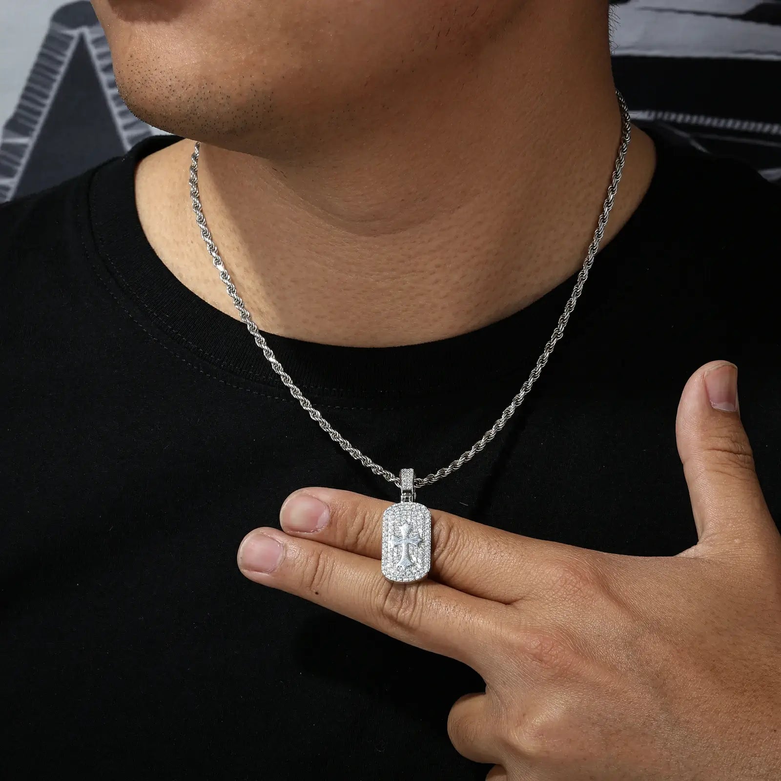 Male model wearing white gold 925 sterling silver moissanite cross sign dog tag pendant with white cuban chain — men’s trendy waterproof luxury jewelry